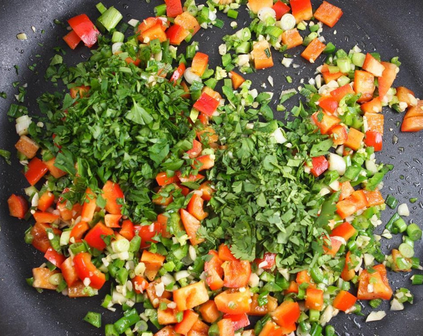 step 2 Add Italian Flat-Leaf Parsley (4 Tbsp) and Fresh Cilantro (4 Tbsp). Cook for an additional 2 minutes.