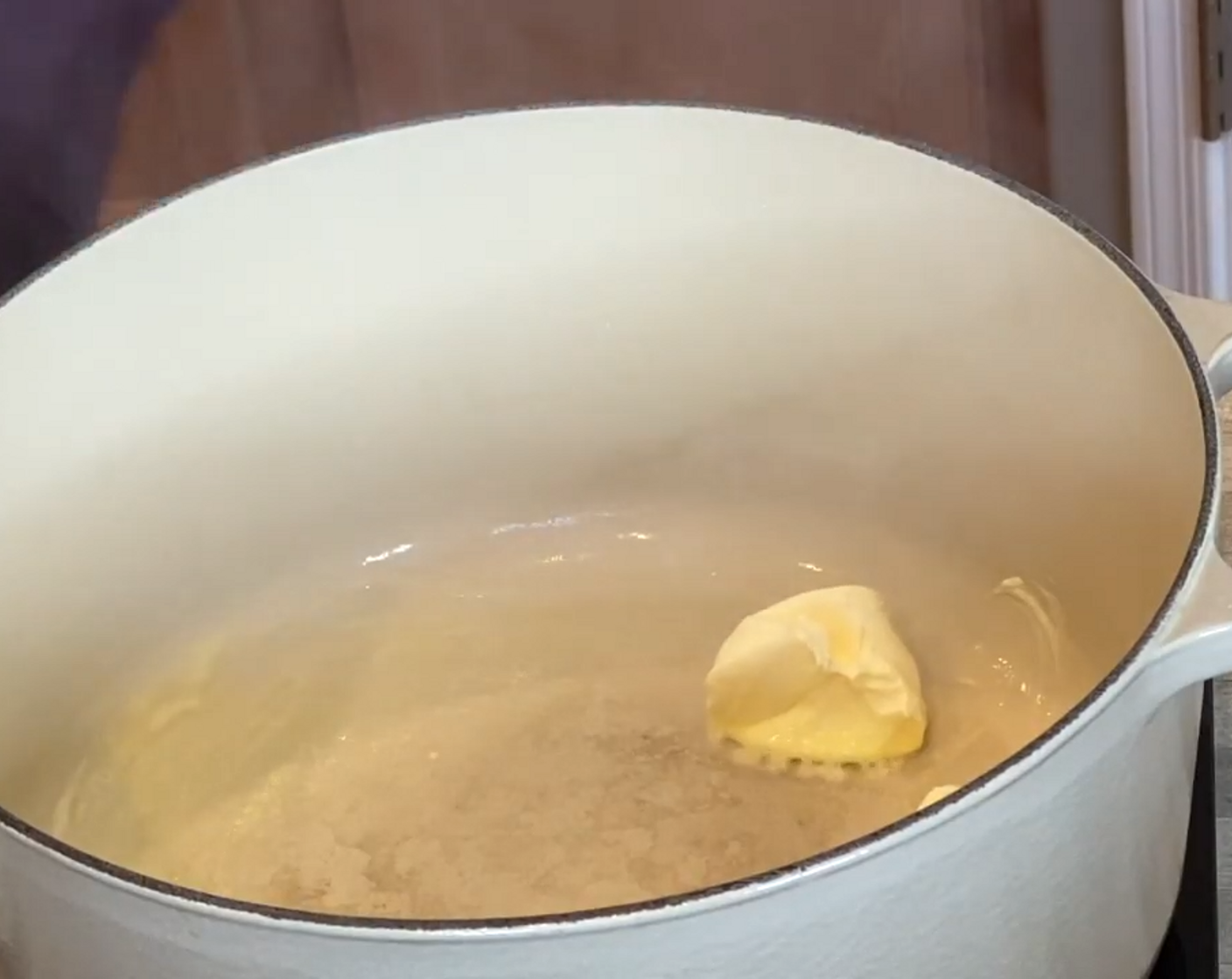 step 2 Melt Butter (1/4 cup) in a large Dutch oven over medium-high heat. Add Onion (1/3 cup) and Garlic (2 cloves) and cook for a few minutes, until onions are soft.