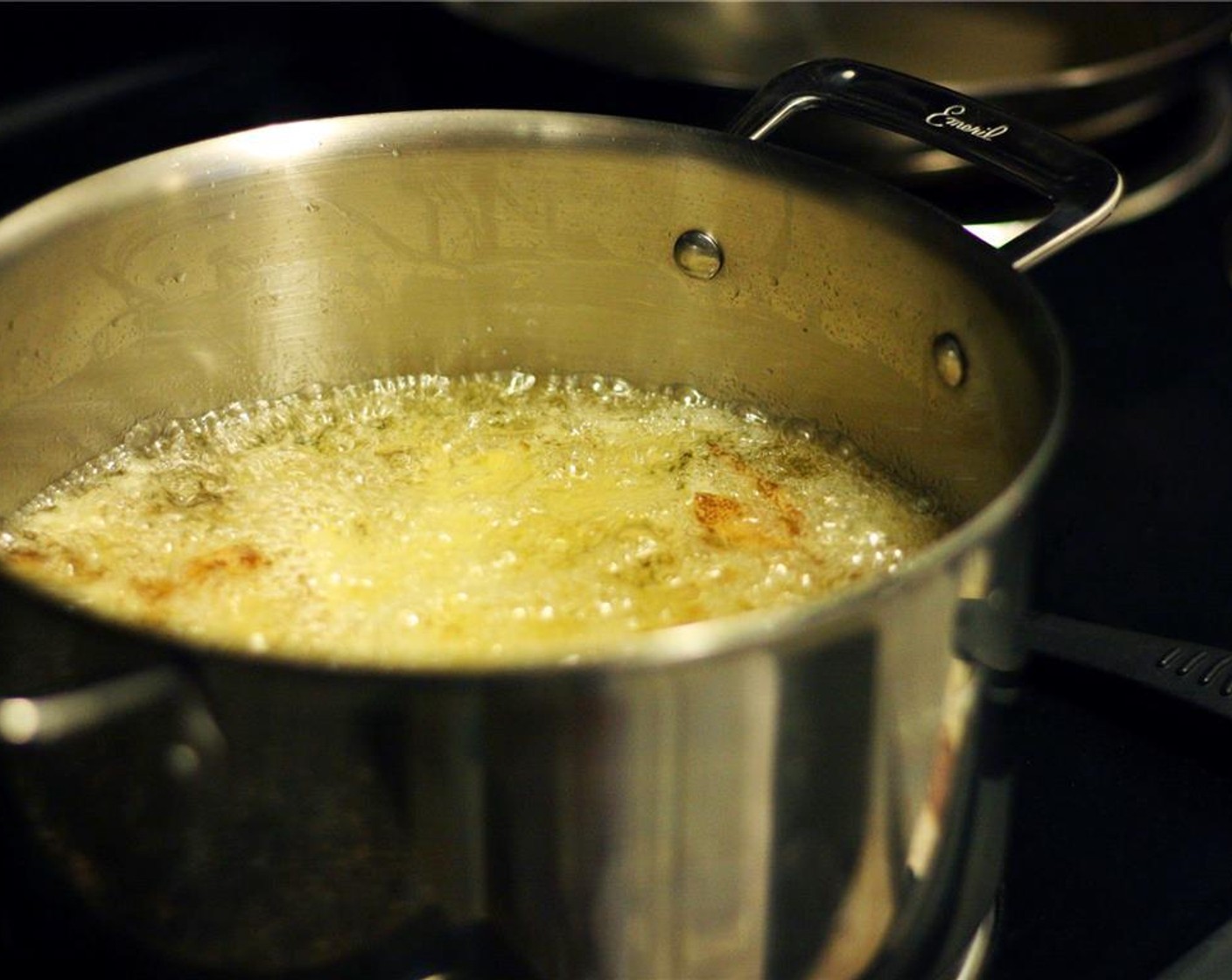 step 7 Once the potatoes are very tender and can be pierced effortlessly with a fork, increase the heat to medium-high. Cook the fries for another 10-15 minutes, turning often with the heat-safe spatula, until they are golden-brown and crisp.