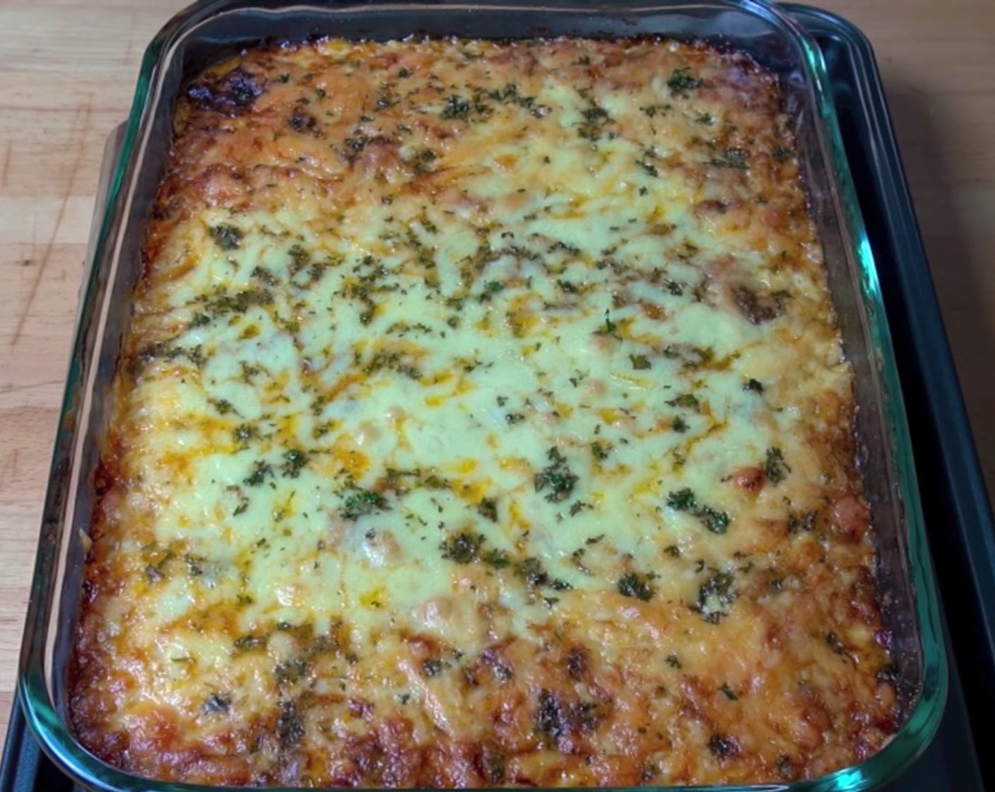 step 9 Place the baking sheet in the oven for about 30 to 35 minutes, or until the bake is golden on top and the entire dish has set.