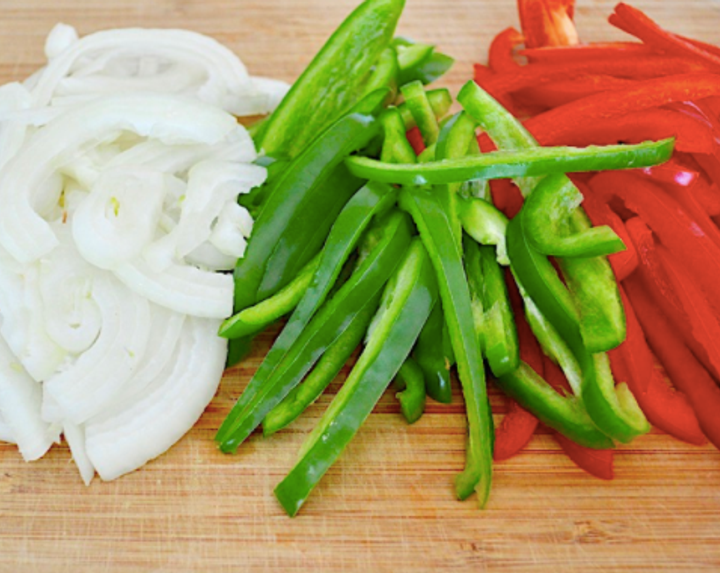 step 2 Remove them from the pan and let them cool enough to handle. Add the Butter (2 Tbsp) to the pan and let it start to melt. Add the Onion (1), Garlic (3 cloves), Green Bell Pepper (1), and Red Bell Pepper (1) and let them soften for 3-5 minutes in the butter.