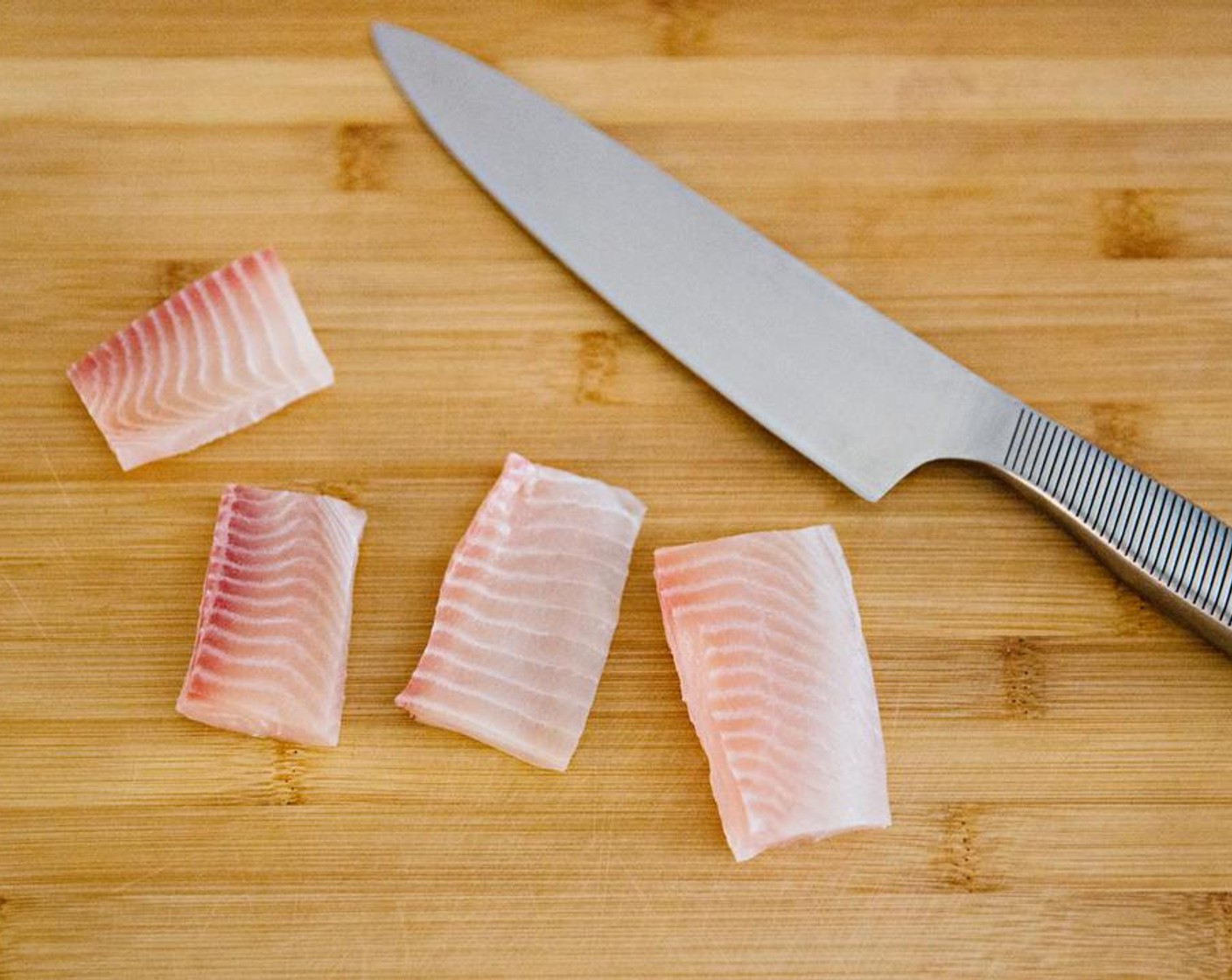 step 1 Clean the Snapper Fillet (1 lb) and cut it into 4 smaller pieces.