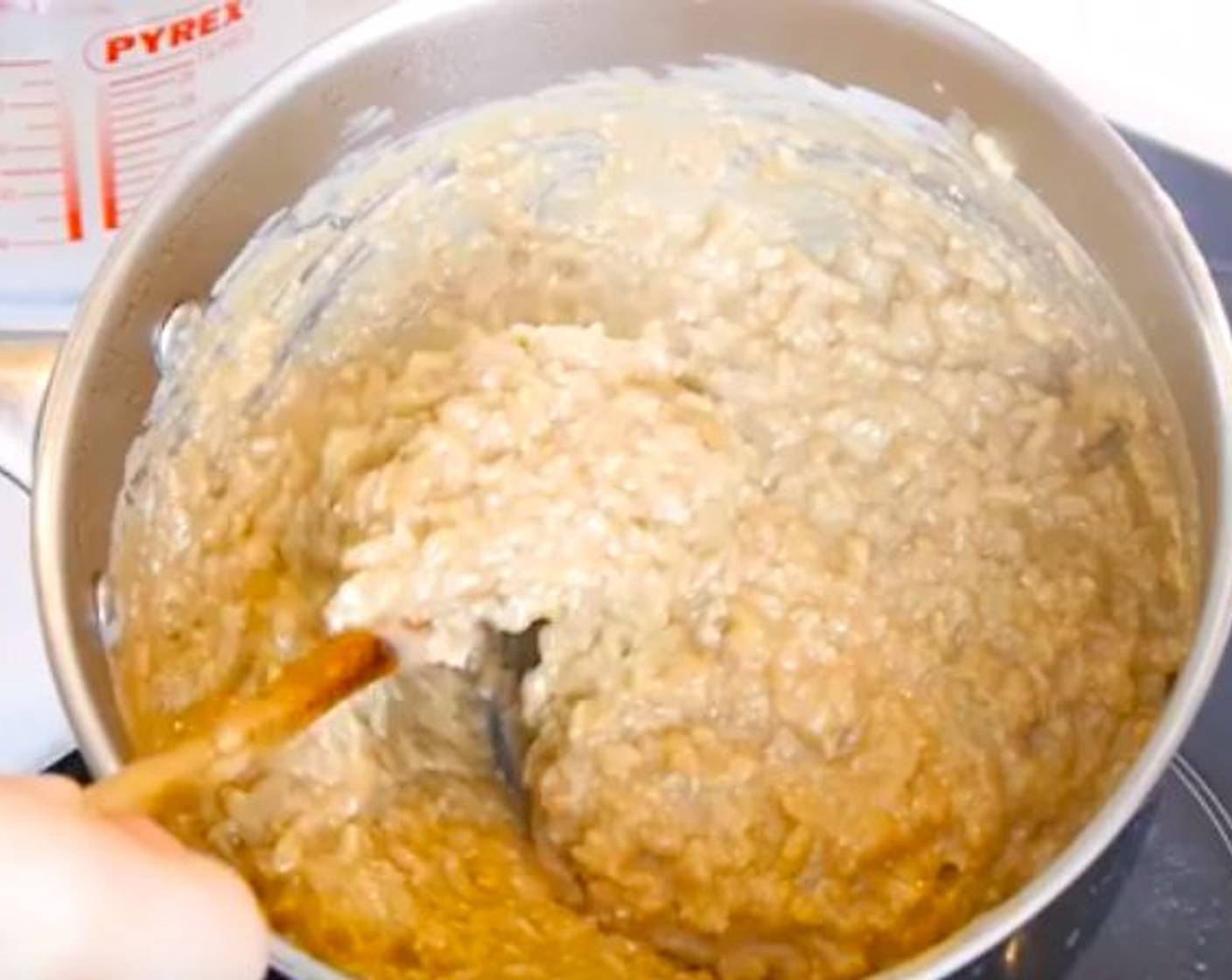 step 3 Once the rice is al dente, take off the heat and add the Lime (1), stir, and then add the Sweetened Shredded Coconut (1 cup).