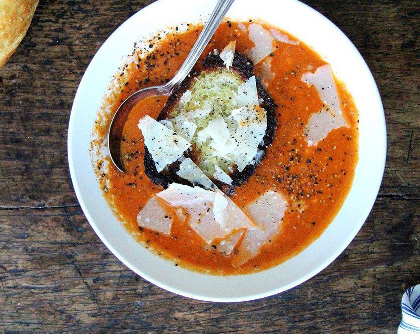 step 6 Ladle soup into bowls and put Parmigiano-Reggiano (to taste) over top. Serve with more pepper on the side and Bread (to taste).