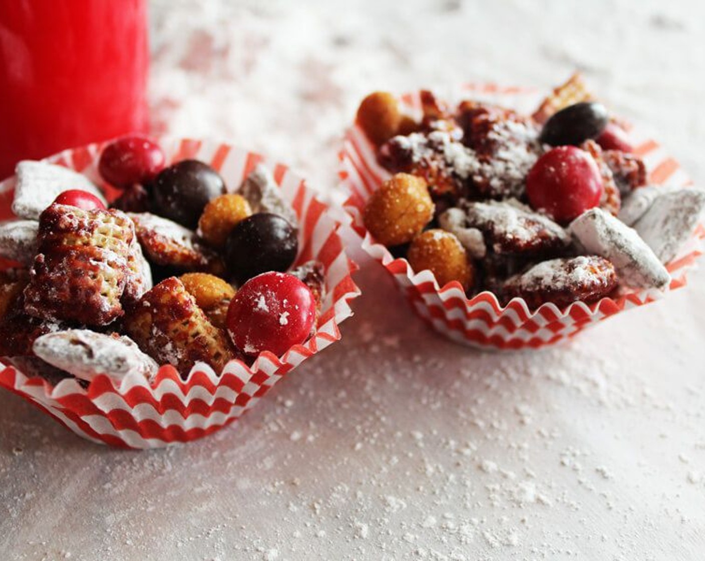 step 8 When the cereal has cooled completely, combine in a large airtight container with the Honey Roasted Peanuts (1 1/2 cups) and red and black M&M's® Milk Chocolate Candy (1 cup). Toss to combine, serve, and enjoy!