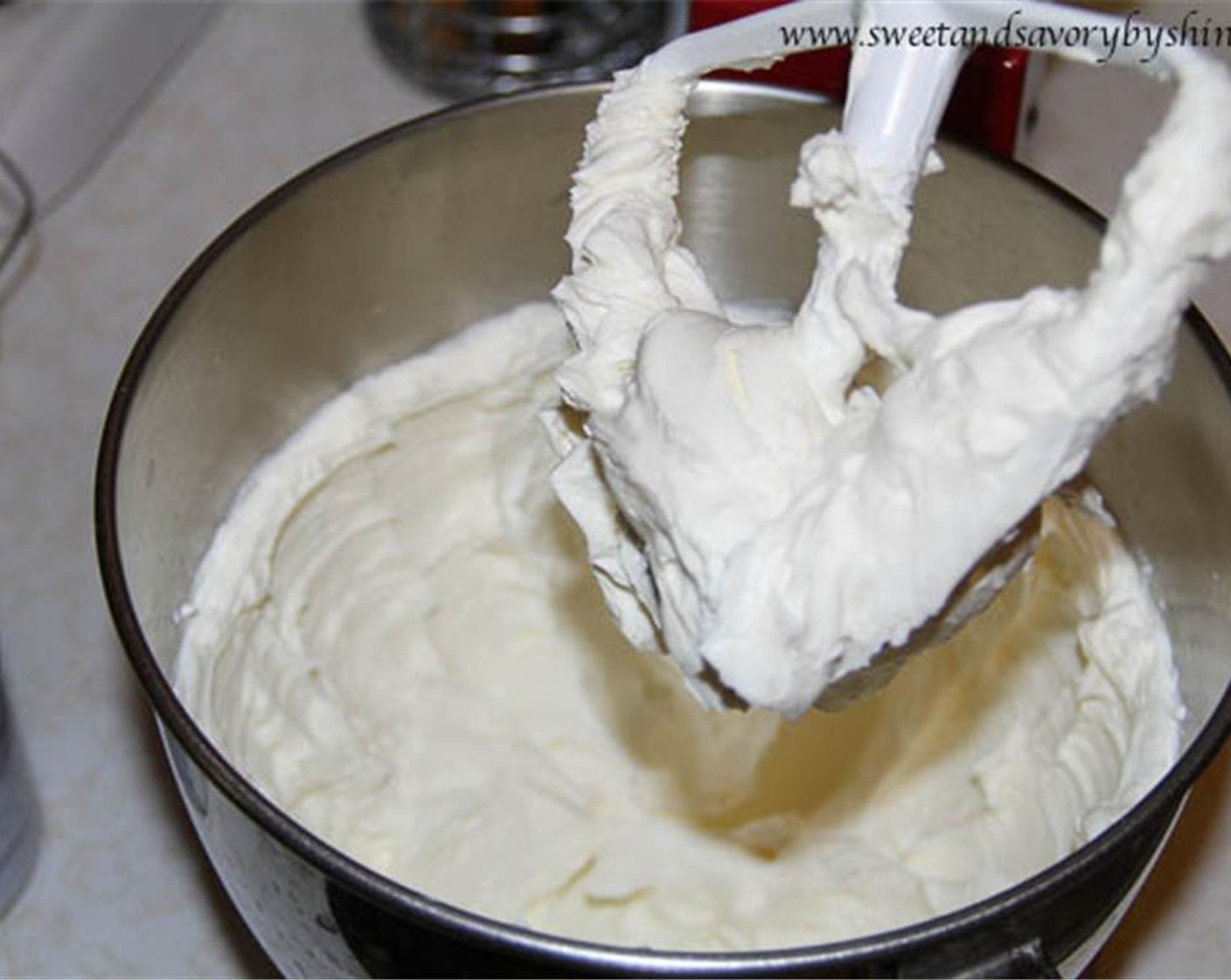 step 5 In a large bowl, beat the Cream Cheese (3 pckg) until fluffy on medium speed. Slowly add in the Sweetened Condensed Milk (1 can).