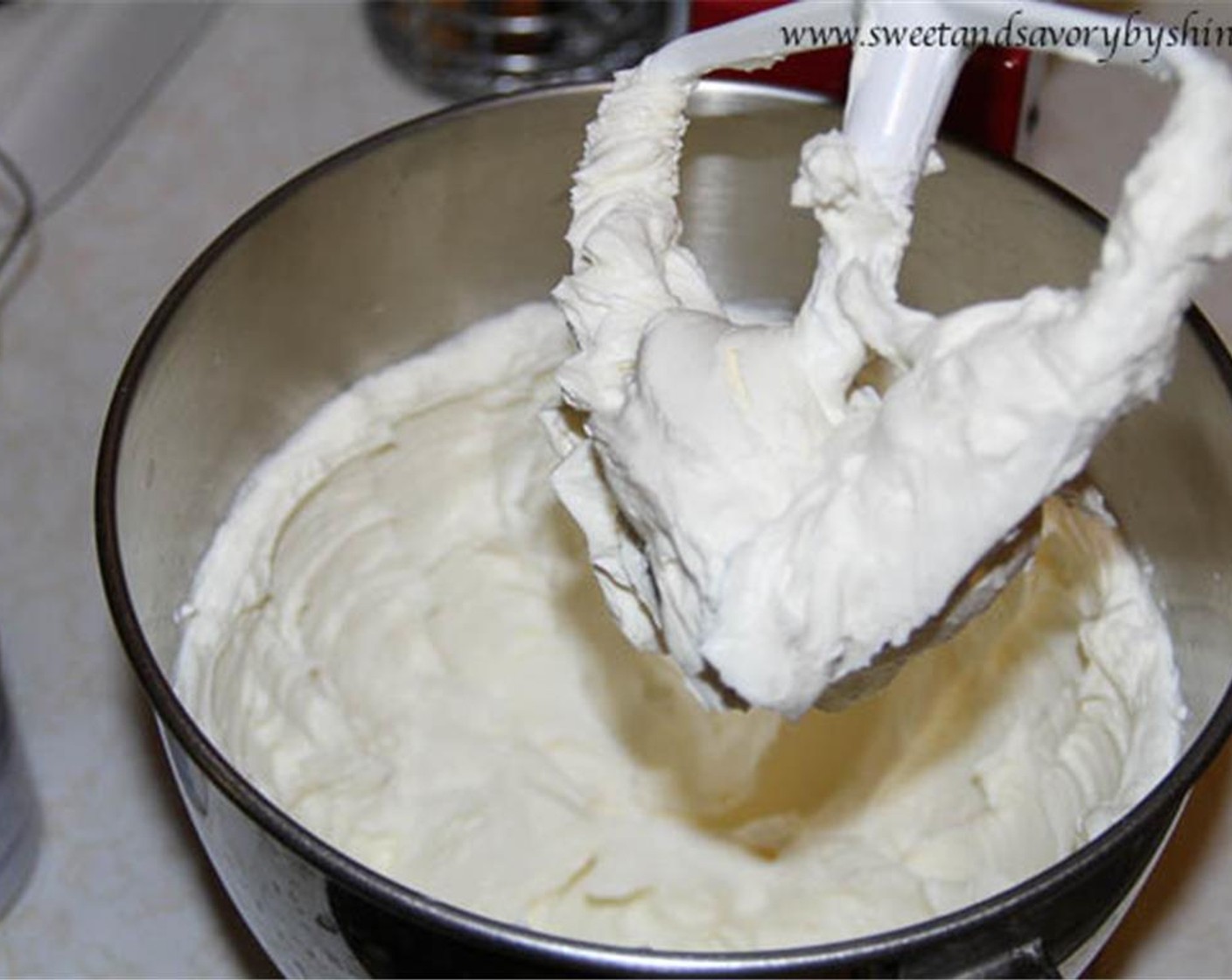 step 5 In a large bowl, beat the Philadelphia Original Soft Cheese (3 pckg) until fluffy on medium speed. Slowly add in the Sweetened Condensed Milk (1 can).