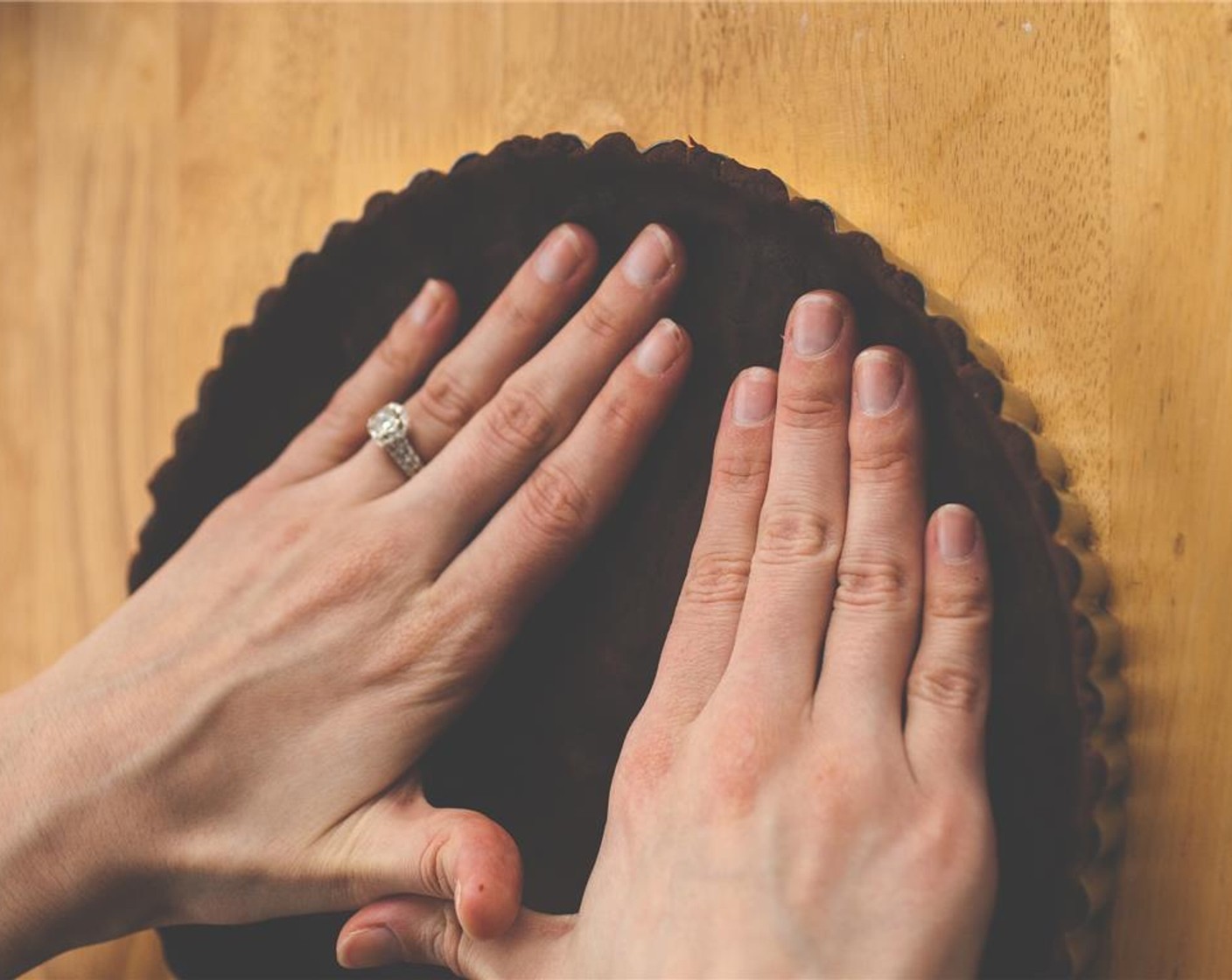 step 3 Press evenly into a 9 inch tart pan, ensuring the dough is brought all the way to the top edge of the pan. Poke with a fork several times, and place in the refrigerator to cool for one hour.