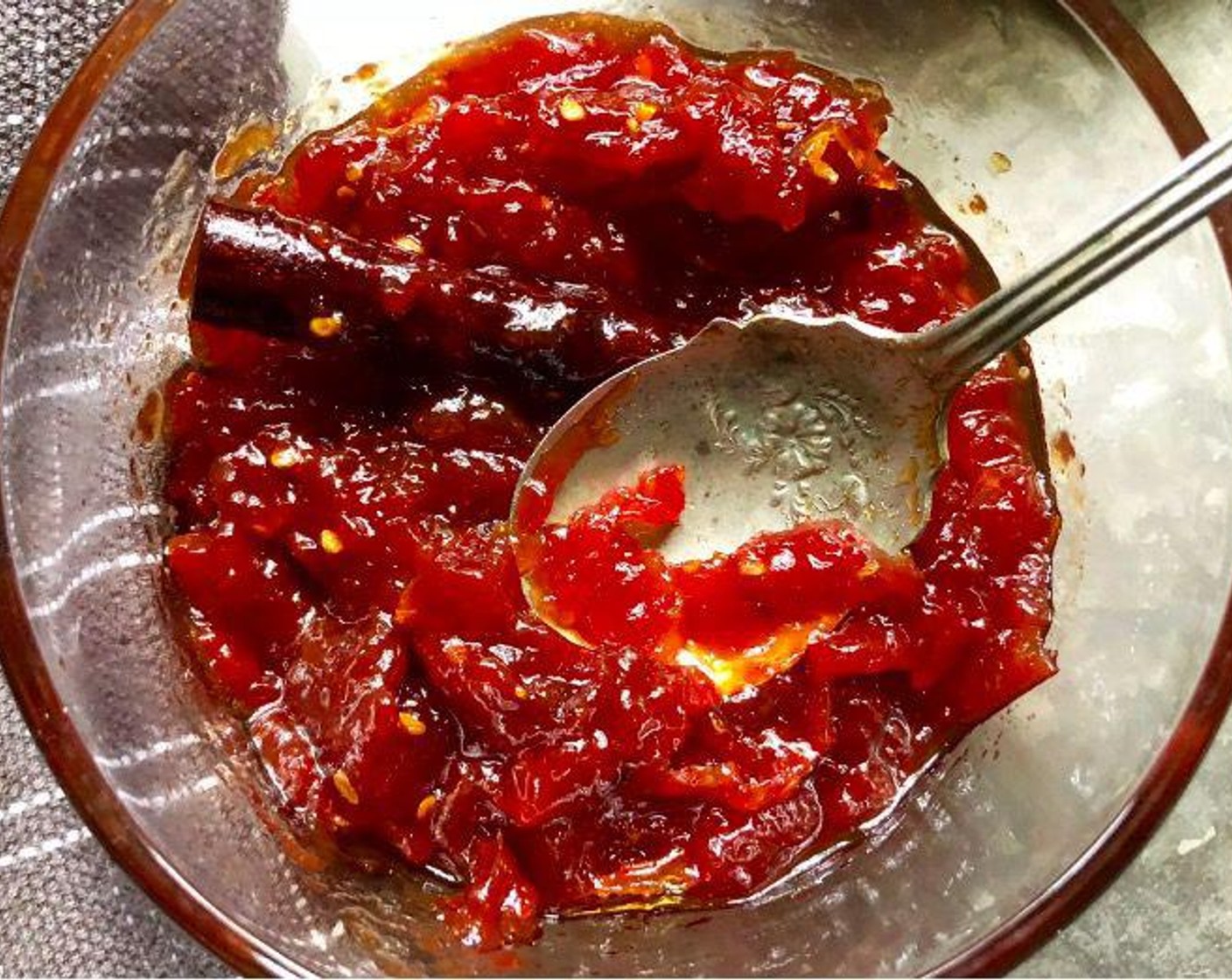 step 6 The tomato juices should begin to gel at 2 hours, but it could happen a little sooner or later. Test the juices by spooning a little onto a plate, letting it cool, and running your finger through it. If it holds the line, the jam is ready.