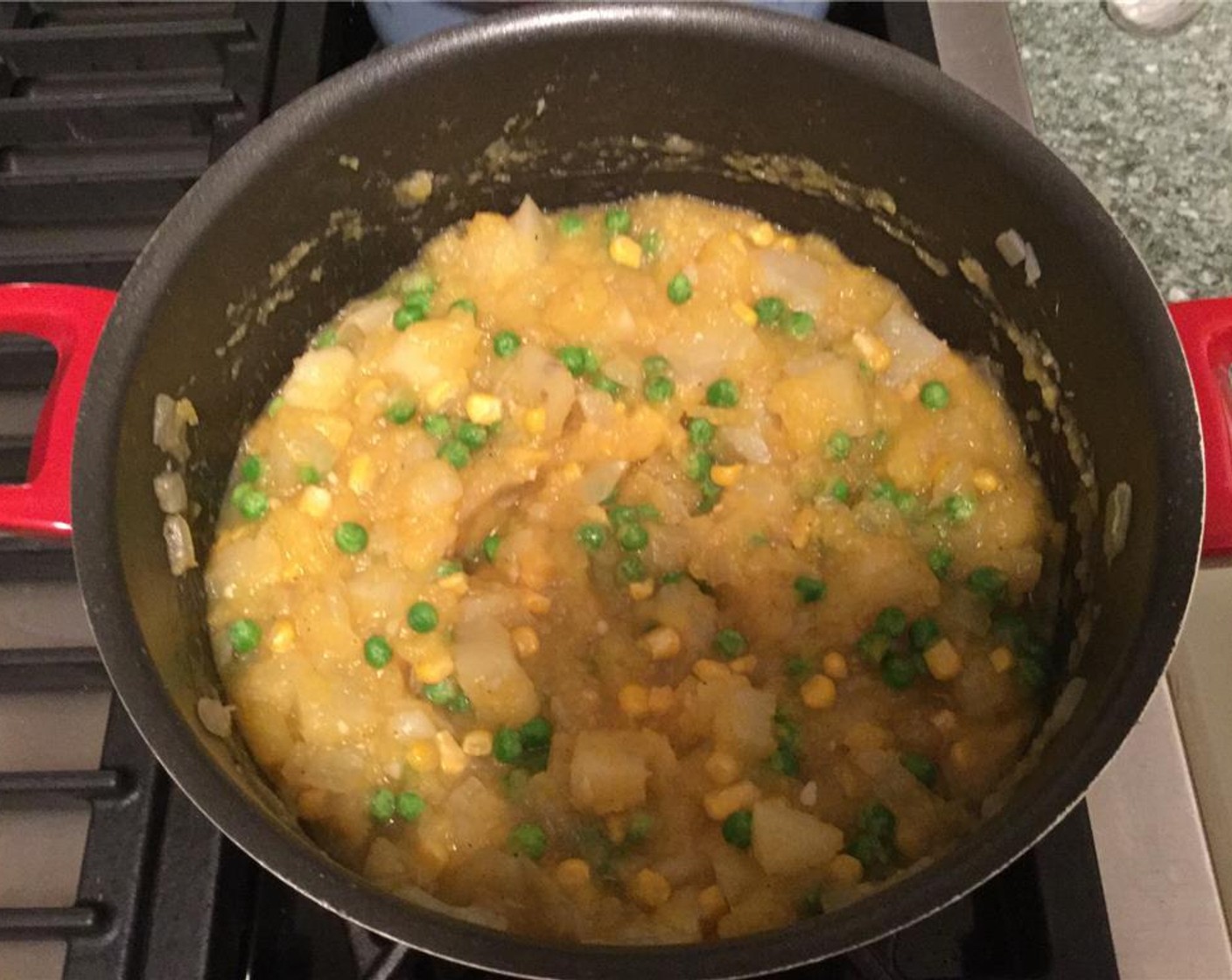 step 11 Add the Green Peas (1/2 cup) and Corn (1/2 cup) and let it cook for a few minutes.