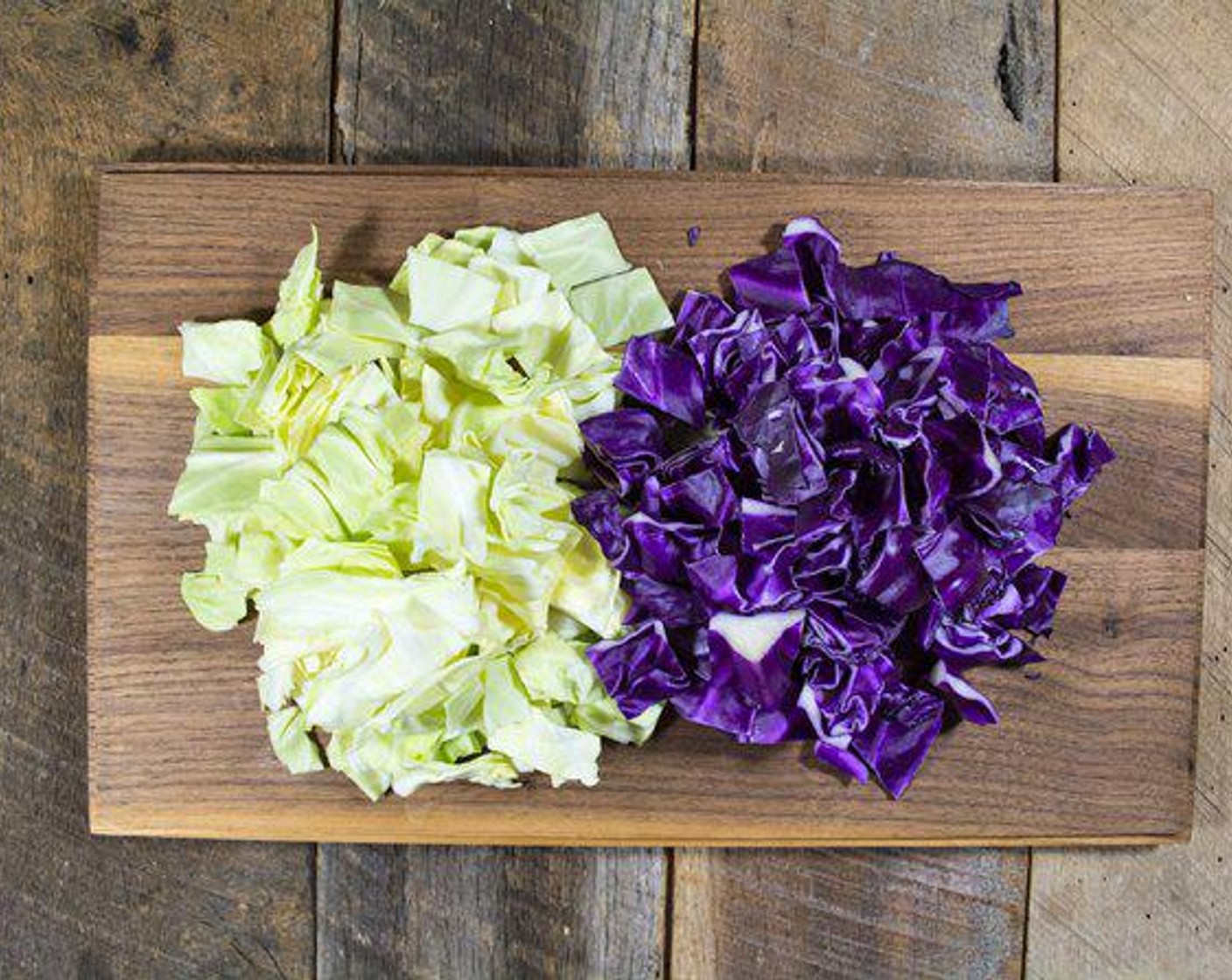 step 2 Add Red Cabbage (1/2 head) and Green Cabbage (1/2 head) to onion and peppers, stir to combine well, and cook 4-5 minutes.