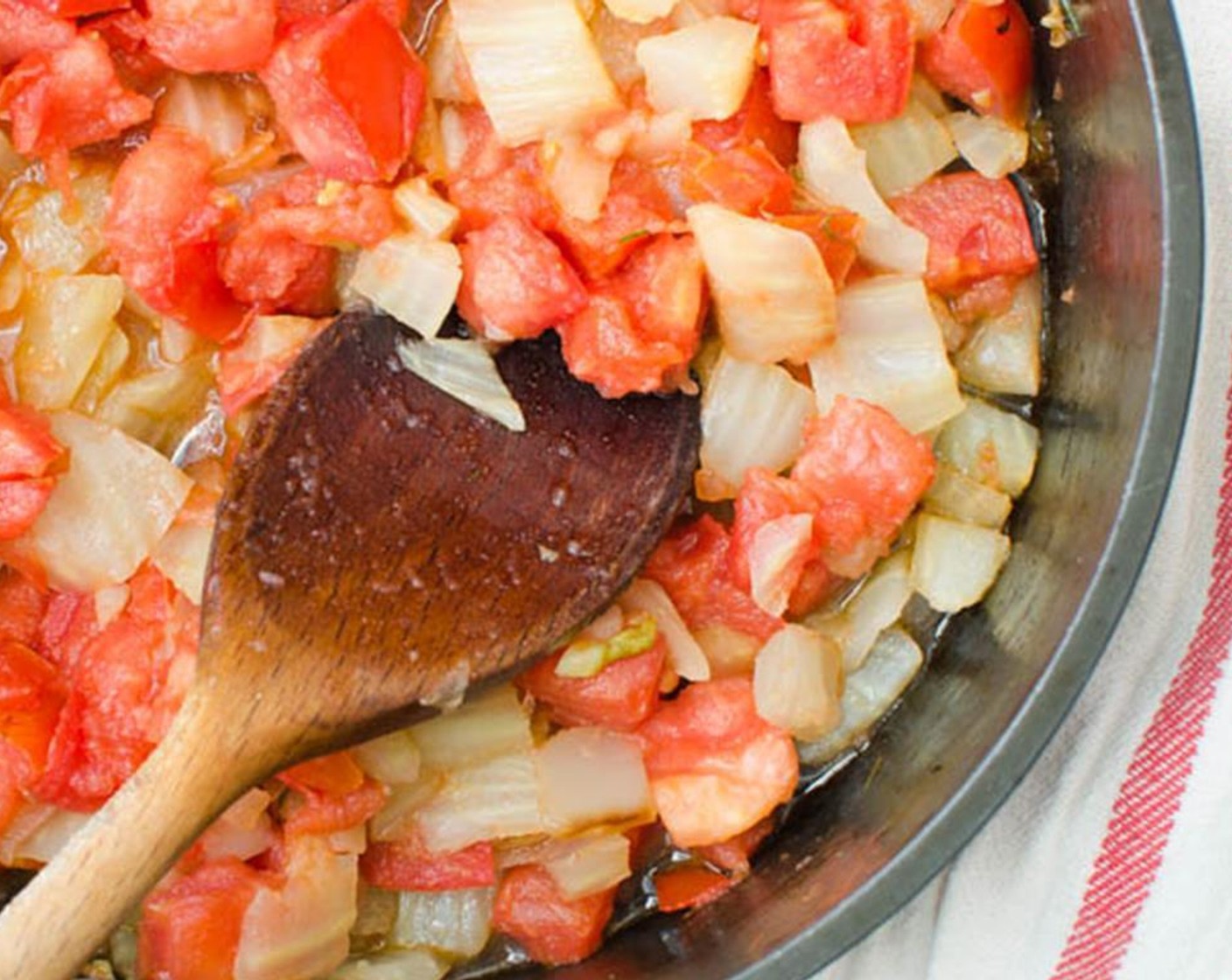 step 4 Stir in chopped Tomato (1). Cover and simmer for an additional 5 minutes, until tomatoes are softened. Season with Salt (to taste) and Ground Black Pepper (to taste). Stir in Balsamic Vinegar (1 Tbsp) and Lemon (1).