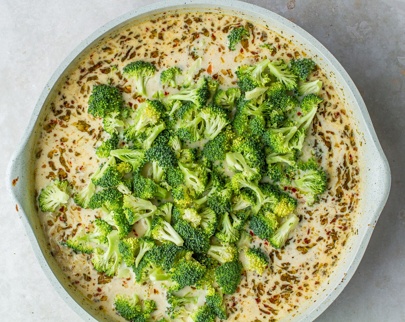 step 7 Remove the lid and stir in the Broccoli Florets (2 cups) then cover and simmer again for 3 minutes.