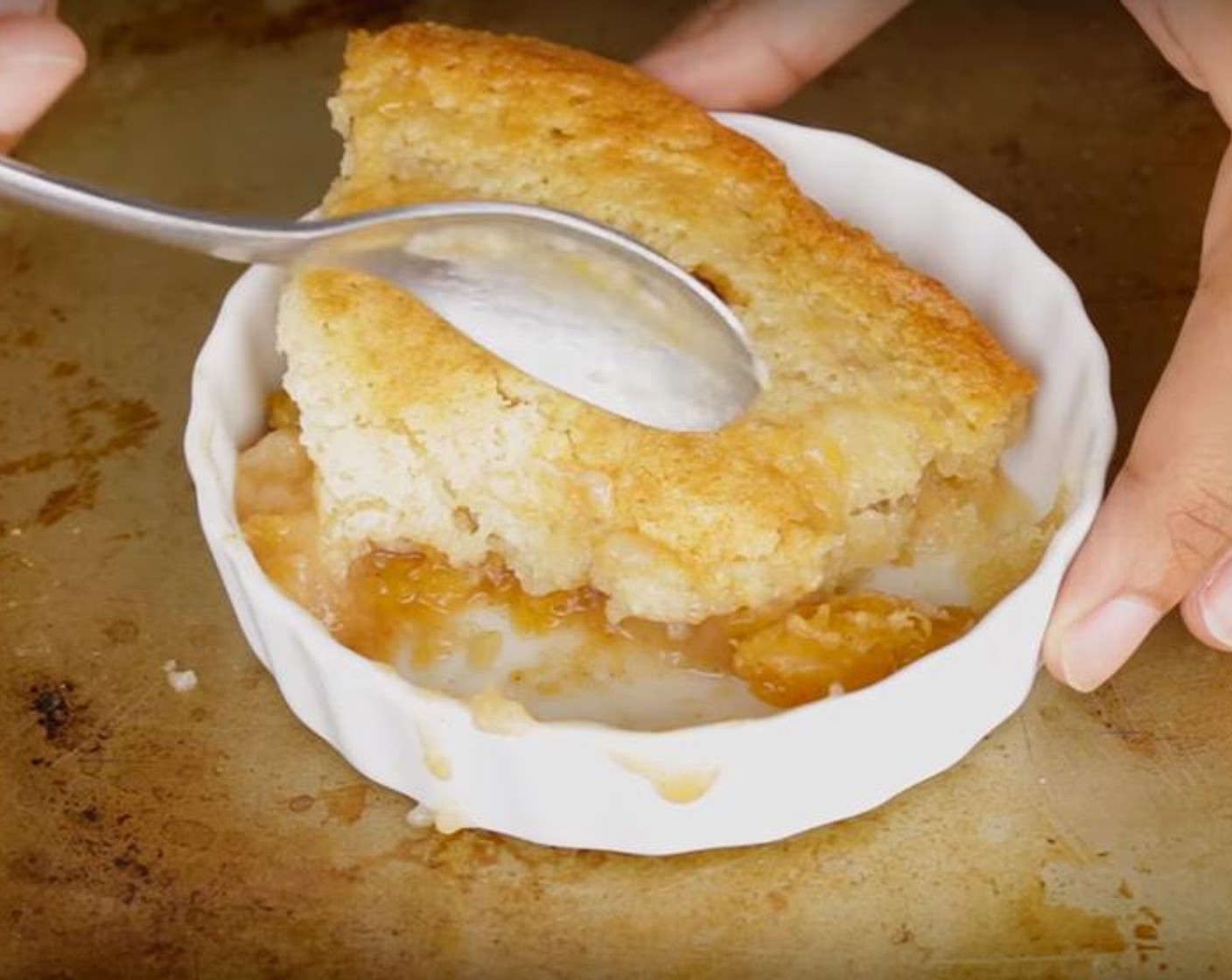 step 4 In a large bowl, add All-Purpose Flour (1 cup), Caster Sugar (3/4 cup), Baking Powder (2 tsp) and Salt (1/2 tsp). Whisk together. In a jug whisk Milk (3/4 cup), Eggland's Best Classic Egg (1) and Vanilla Extract (1/2 tsp). Add to flour mixture and mix until combined and no lumps. Pour batter on baking dish. Add the cooked peaches on top.