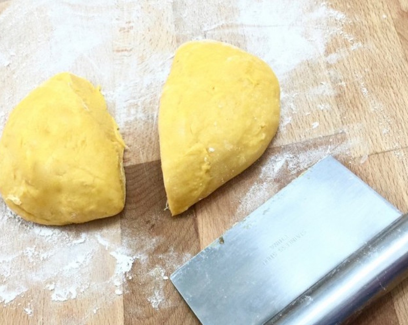 step 8 Divide the dough into two equal halves for easier handling.