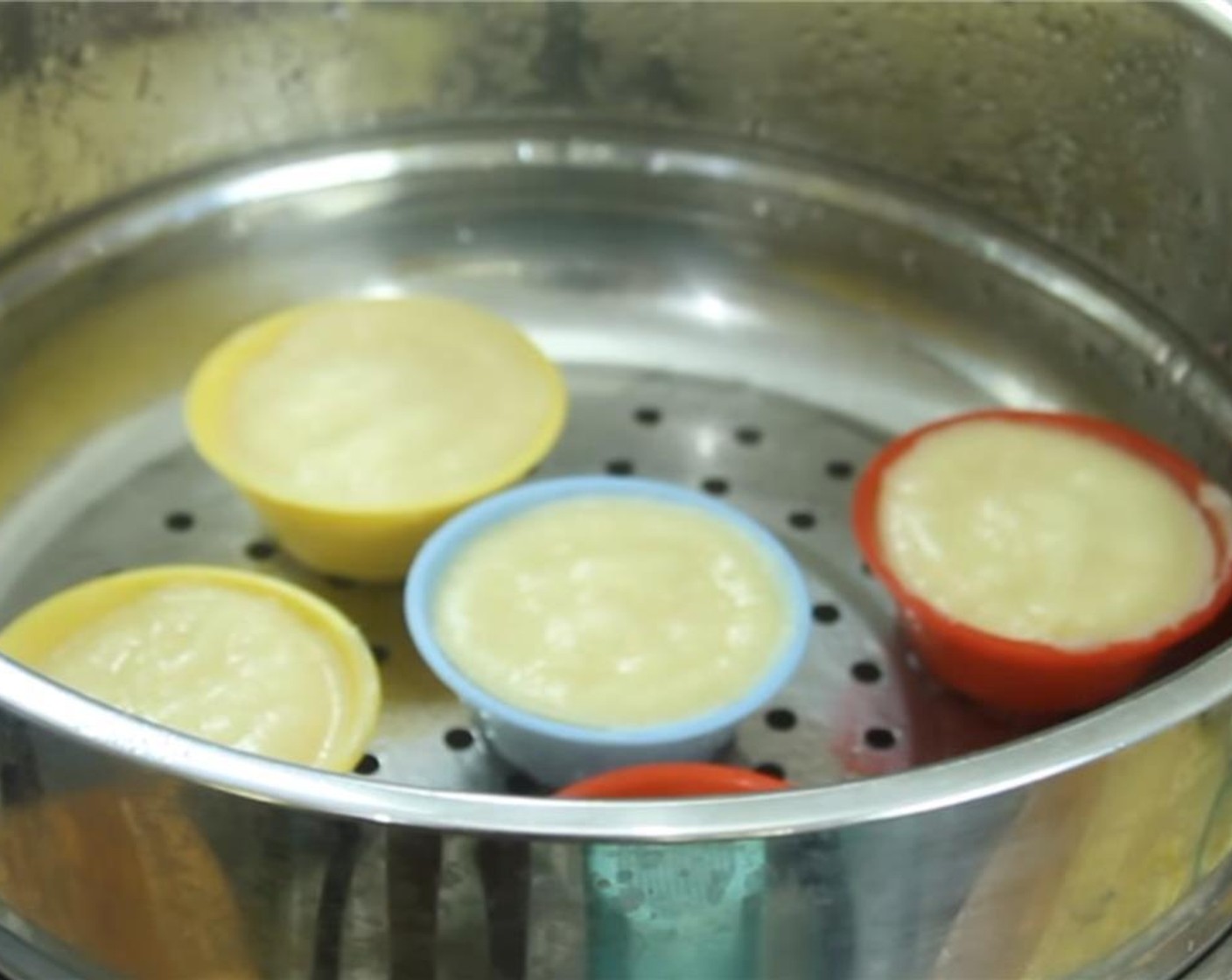 step 8 Place the molds back into the steamer for an additional 8 to 10 minutes.