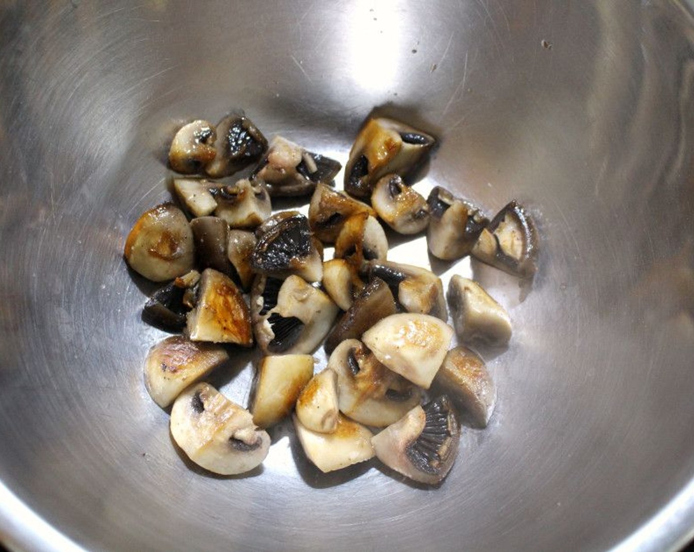 step 1 In a medium frying pan, heat Butter (1/2 cup) over medium heat. Once melted, sauté Button Mushroom (1 cup) until golden. Place into a warm bowl.