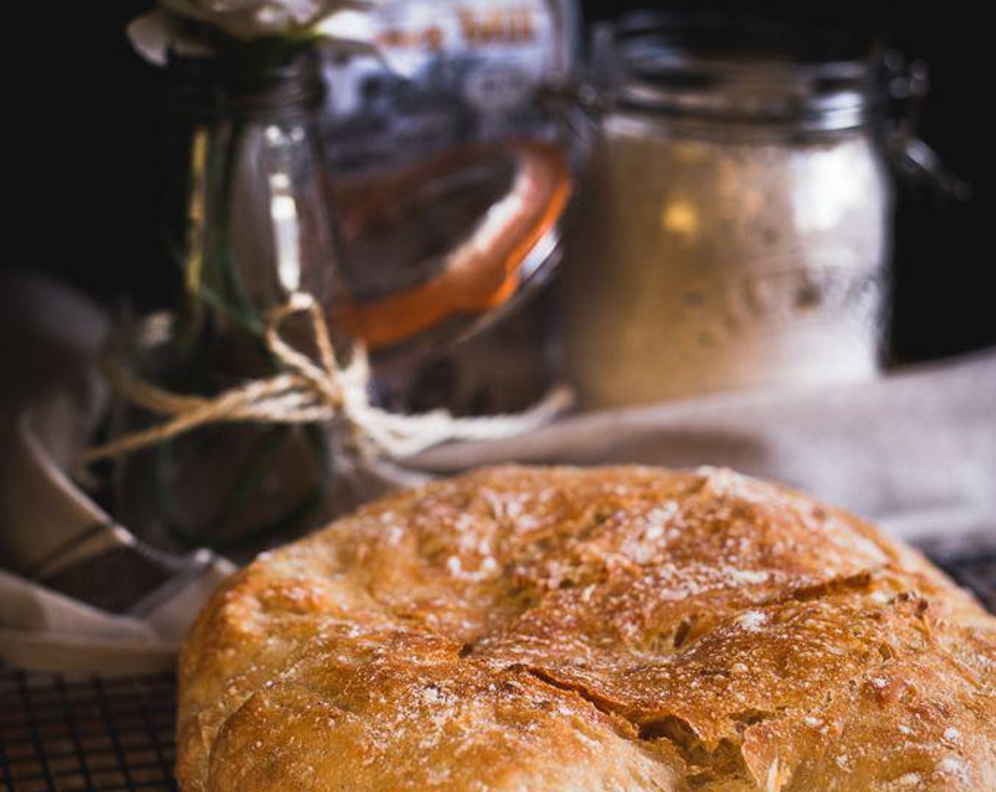 step 6 After 30 minutes, remove the lid and parchment paper and continue to bake for another 15 to 20 minutes or until golden brown on top. Once baked, remove from the pot and place on a cooling rack. Serve and enjoy!