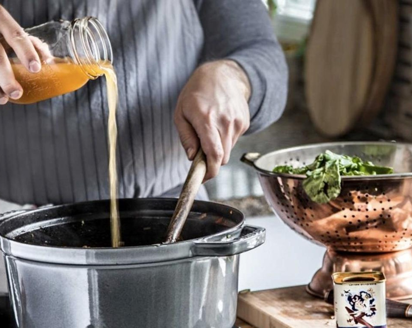 step 9 Add the browned lamb back to the pot along with the Chicken Stock (2 cups) and cremini mushroom. Bring everything to a steady simmer and allow the liquid to reduce by half.