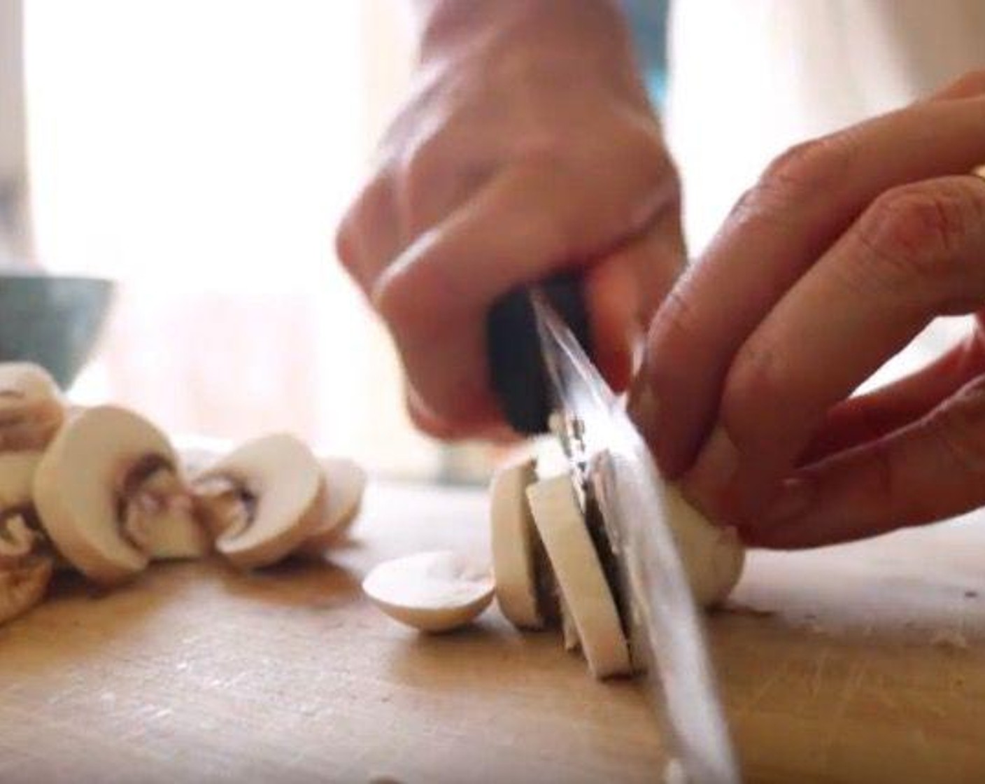 step 6 Meanwhile, cut the Button Mushrooms (12) into 1/4-inch thick slices and set aside.