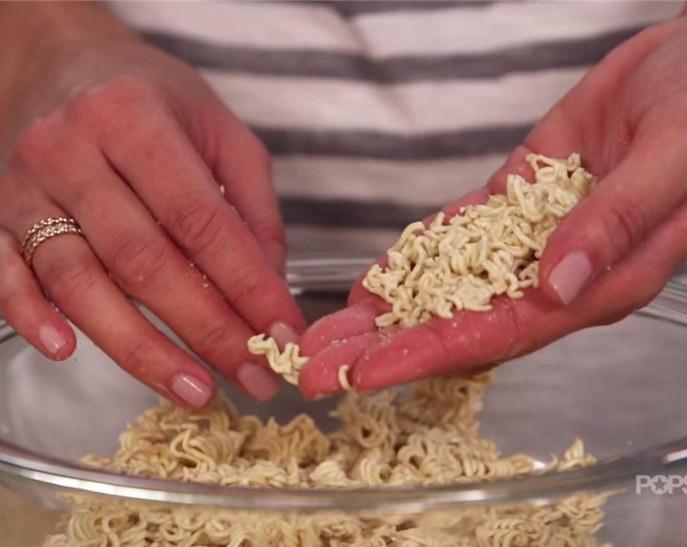 step 4 Into a third bowl, break apart the Ramen Noodles (2 pckg) with your hands. You want the pieces to be small enough that they stick to the chicken, while big enough that they keep their shape. Like what's in my hand. Be sure to set aside a pack of the included ramen seasoning.