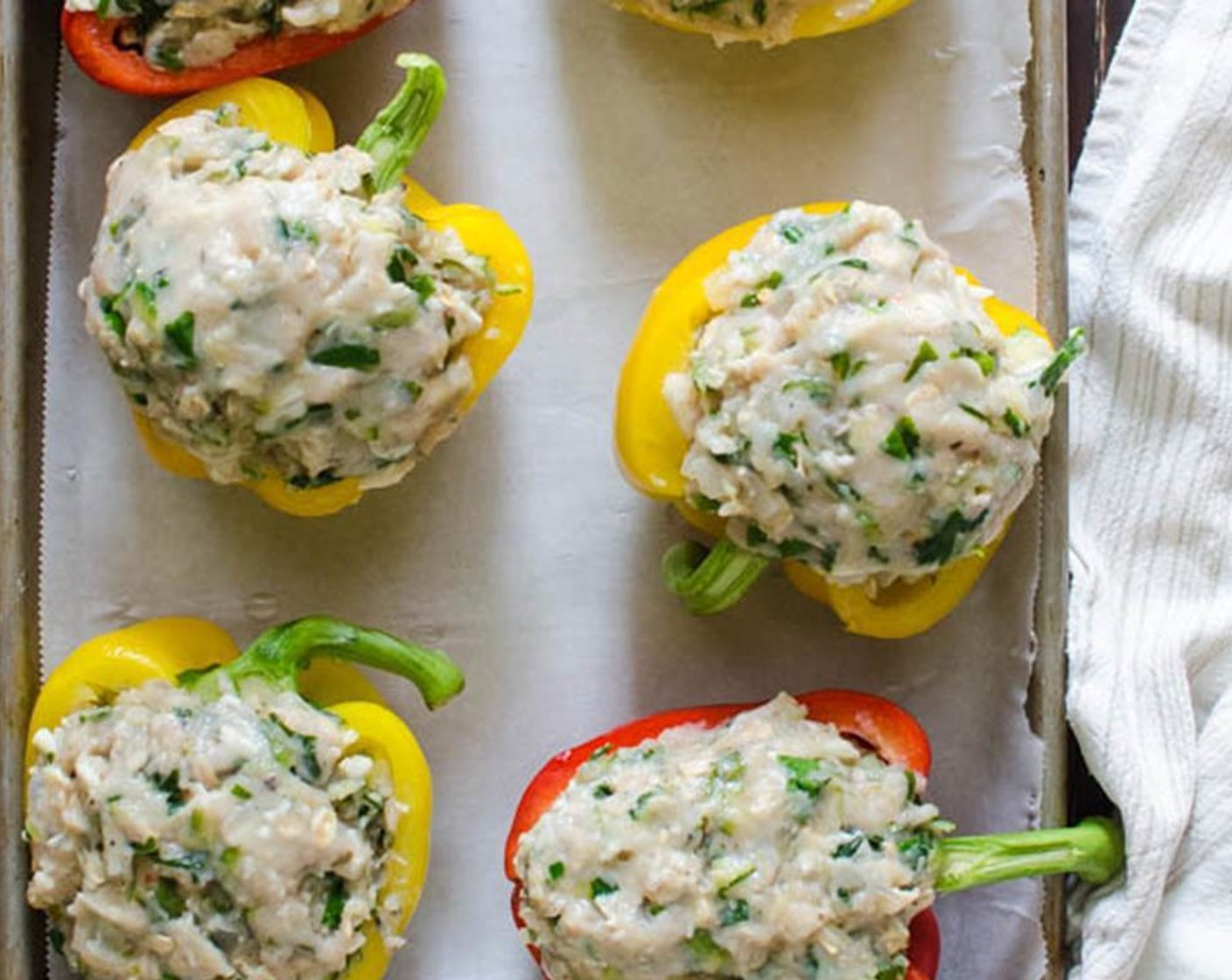 step 6 Liberally fill peppers with turkey stuffing, making sure to tuck the stuffing into the crevices of the pepper. There should be enough stuffing to mound atop the peppers. Wet your hands with water and even out the turkey mixture with your fingers.