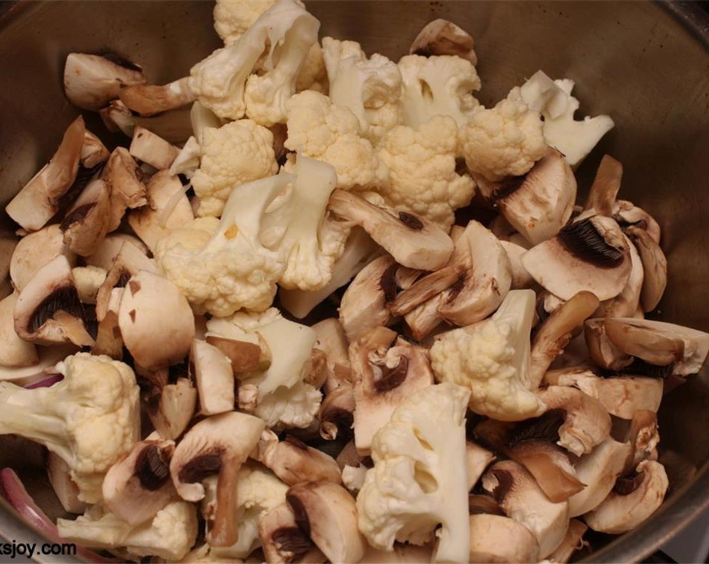 step 8 Next add Mushrooms (2 1/2 cups) and cauliflower and sauté for 10 minutes.