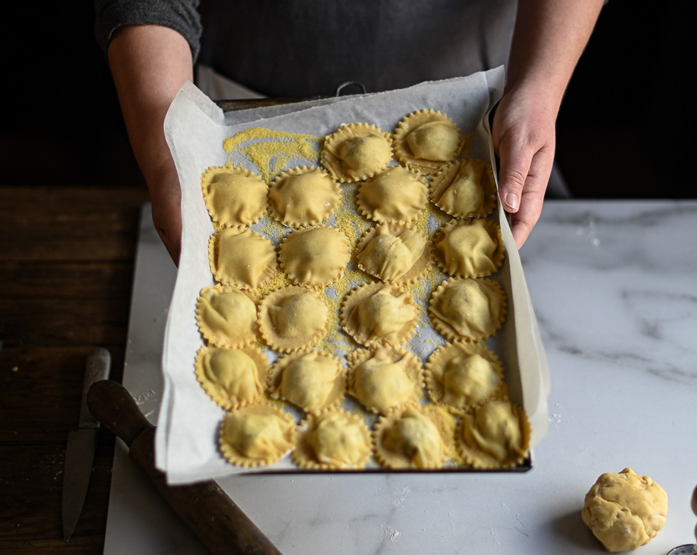 step 8 Seal the edges of the ravioli pockets with a brush of water and if desired, use a ravioli cutter to press out small pockets.