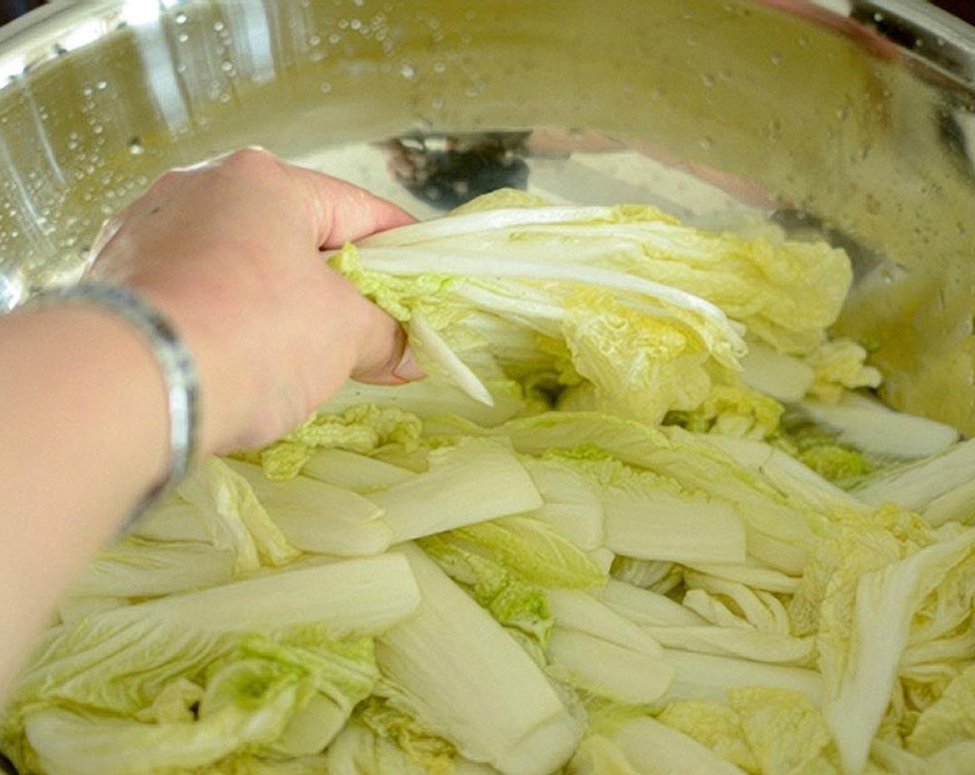step 7 Flip the cabbages over and continue to soak for 5 more minutes.
