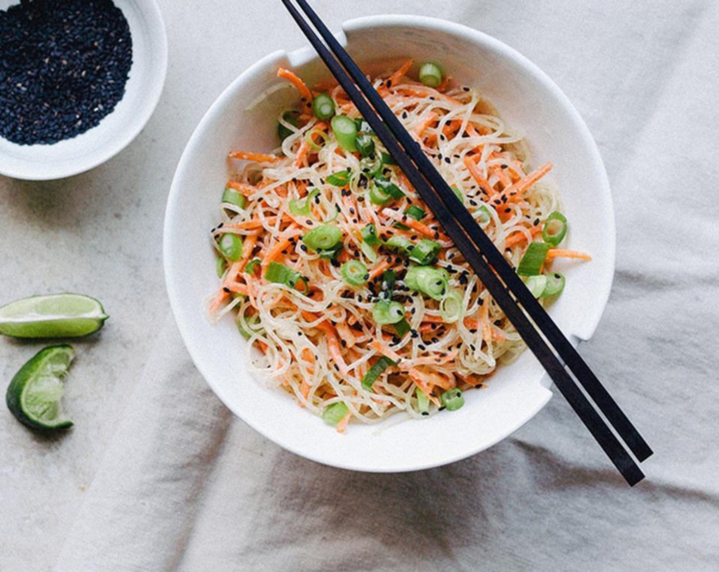 step 3 Serve in individual bowls garnished with Scallion (1 bunch) and Black Sesame Seeds (to taste). Top with Lime Juice (to taste). Enjoy!