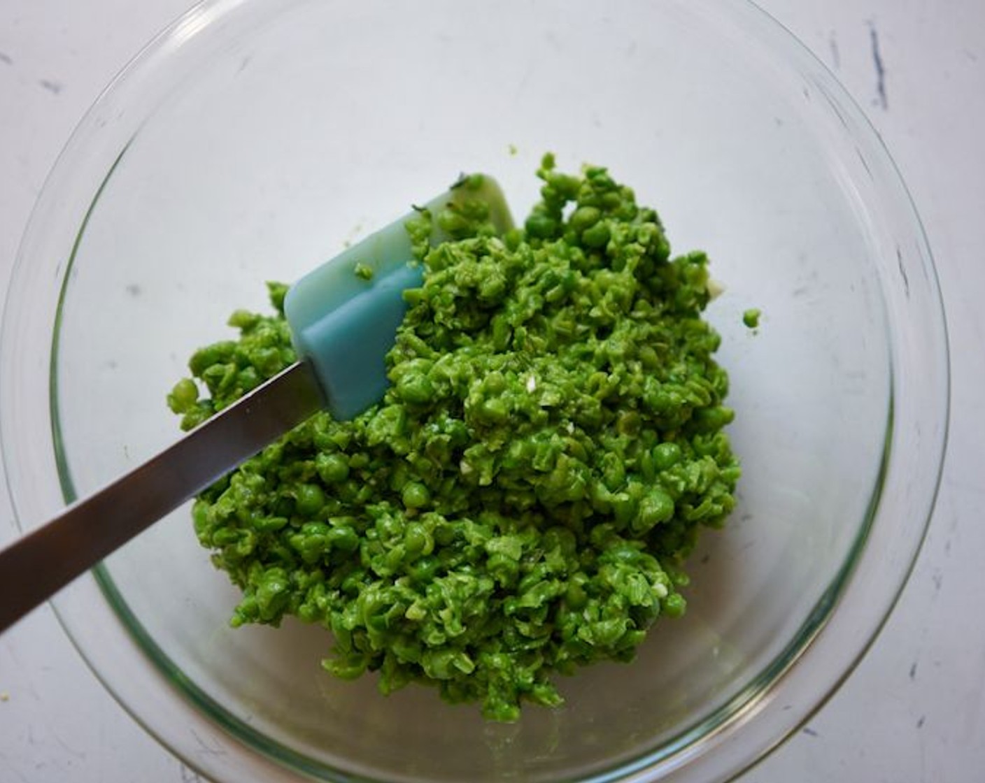step 7 Spread pea mixture onto toasted bread slices. Break Calabrian ’Nduja (3 oz) into small pieces, placing 2 – 3 chunks on each slice of bread.