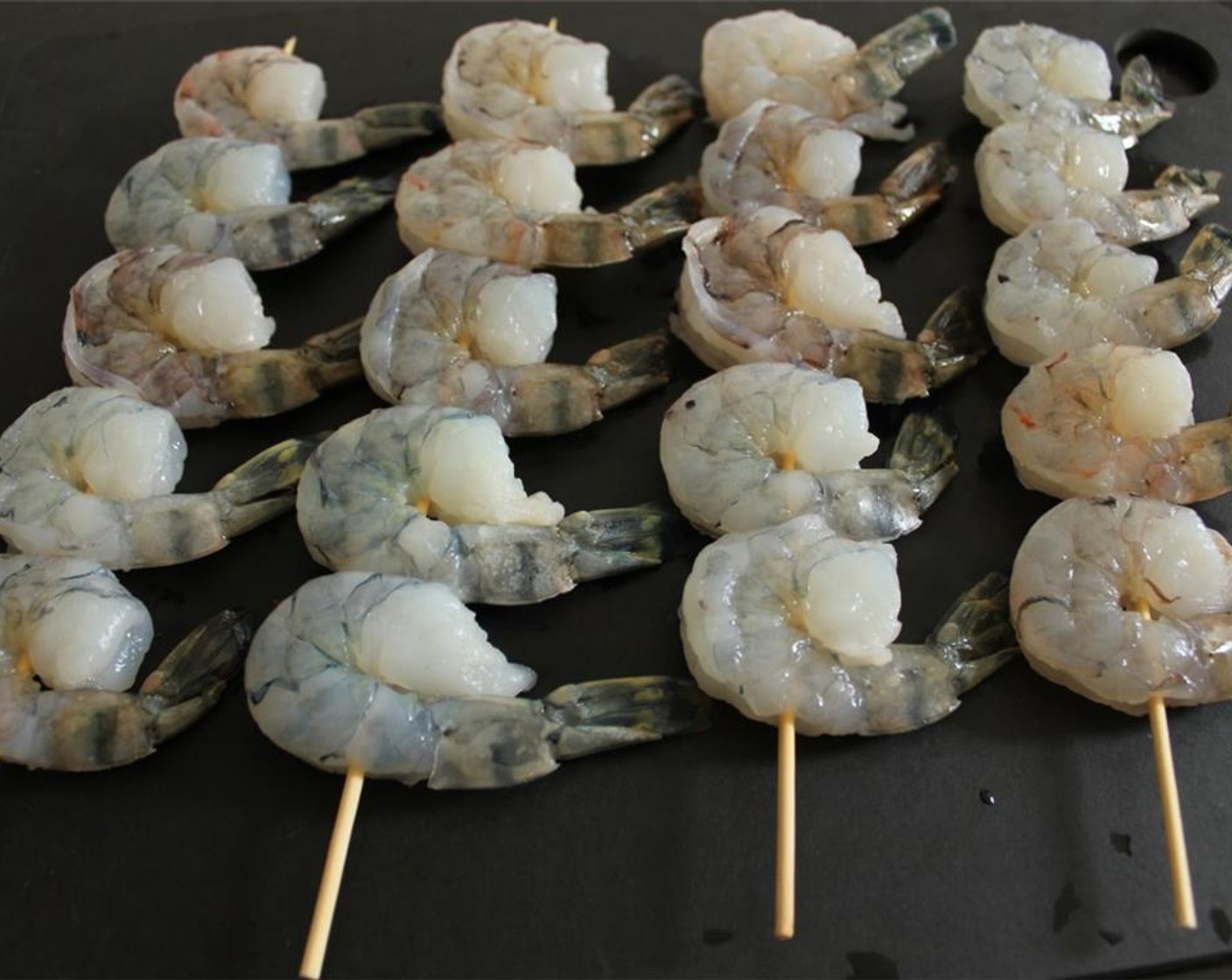 step 3 Thread 4-5 Large Shrimp (1 lb) onto each skewer, depending on the size of the shrimp.