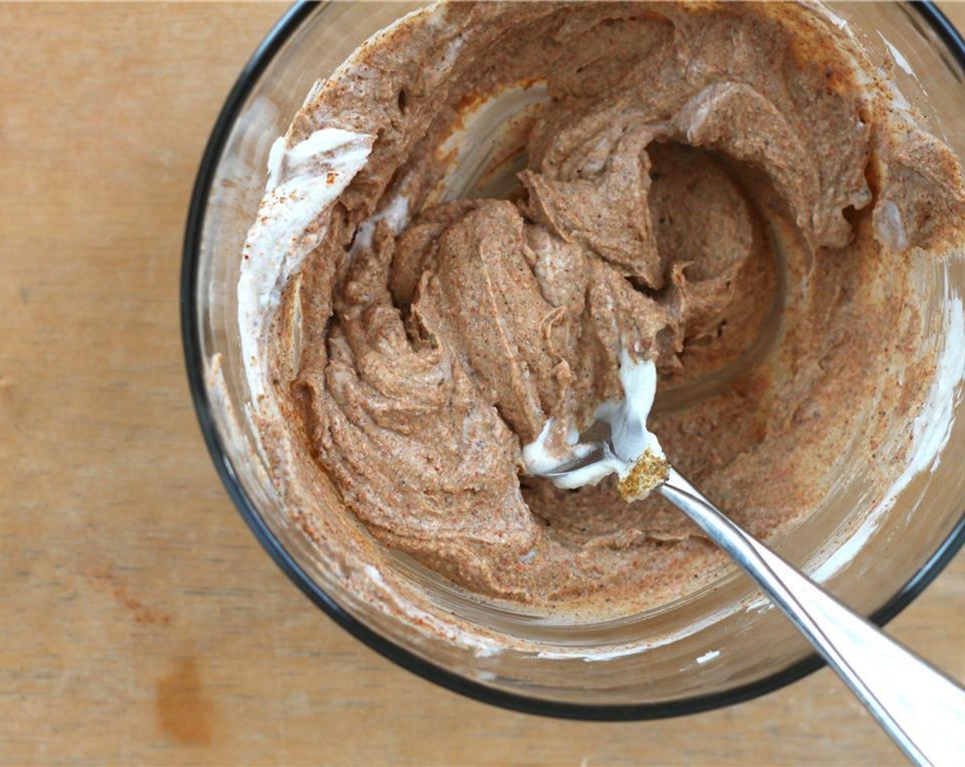 step 2 In a medium-sized bowl, mix together the Greek Yogurt (1/4 cup), the juice from Lemon (1/3) and Ground Allspice (1/4 tsp) to make a marinade.