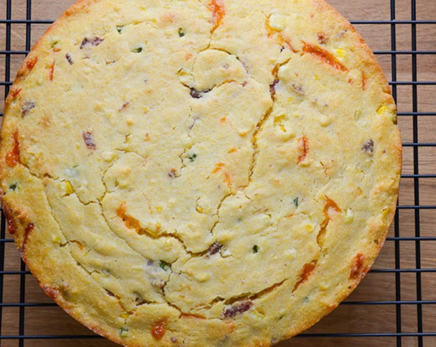 step 10 Cool on a wire rack for 10 minutes, Turn the cornbread out of the pan and cool for a few minutes more on the wire rack. Cut into wedges or squares and serve.