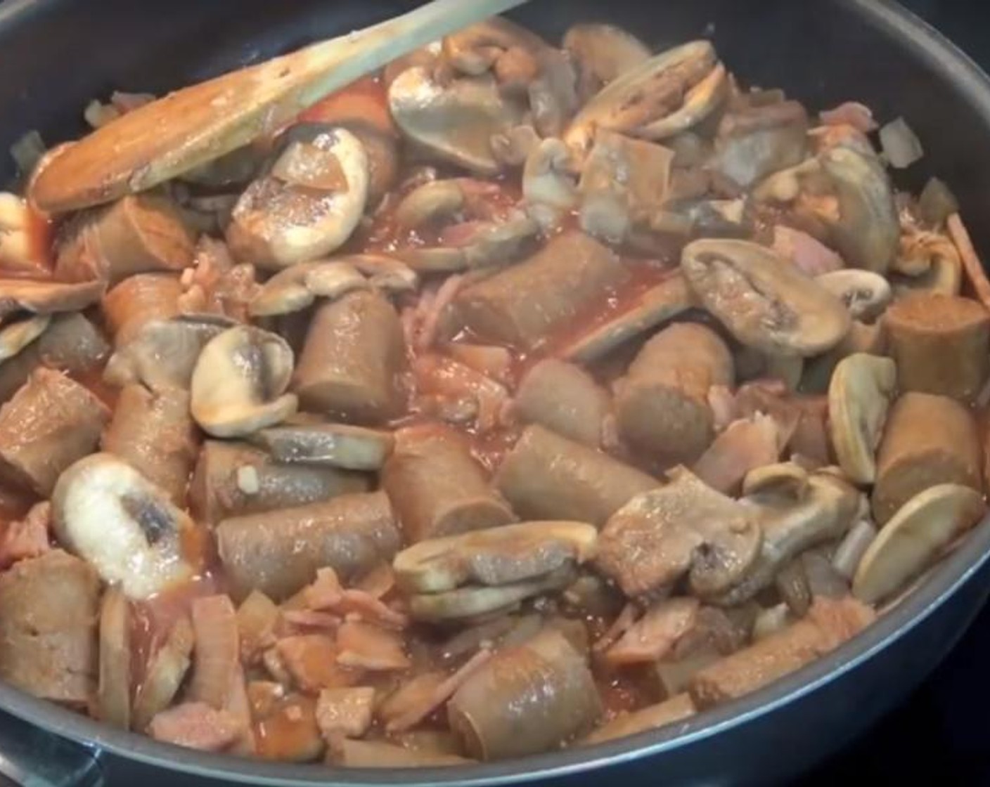 step 4 Add in Mild Paprika (1 Tbsp) and Tomato Paste (1/4 cup) and Beef Stock (1 cup). Mix them around and allow it to simmer.