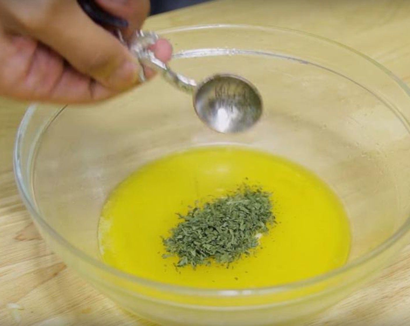 step 3 For the butter mixture topping: In a bowl, put Butter (1/2 stick), then add Garlic (2 cloves), McCormick® Garlic Powder (1/2 tsp) and Dried Parsley (1 tsp). Mix together until combined.