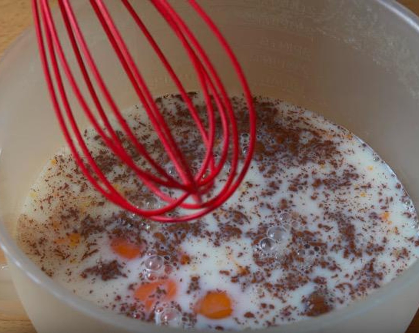 step 2 In a mixing jug, add Eggs (6), Brown Sugar (1 Tbsp), Ground Cinnamon (1 tsp), Vanilla Extract (1 tsp) and Milk (2 cups). Whisk everything together until smooth.