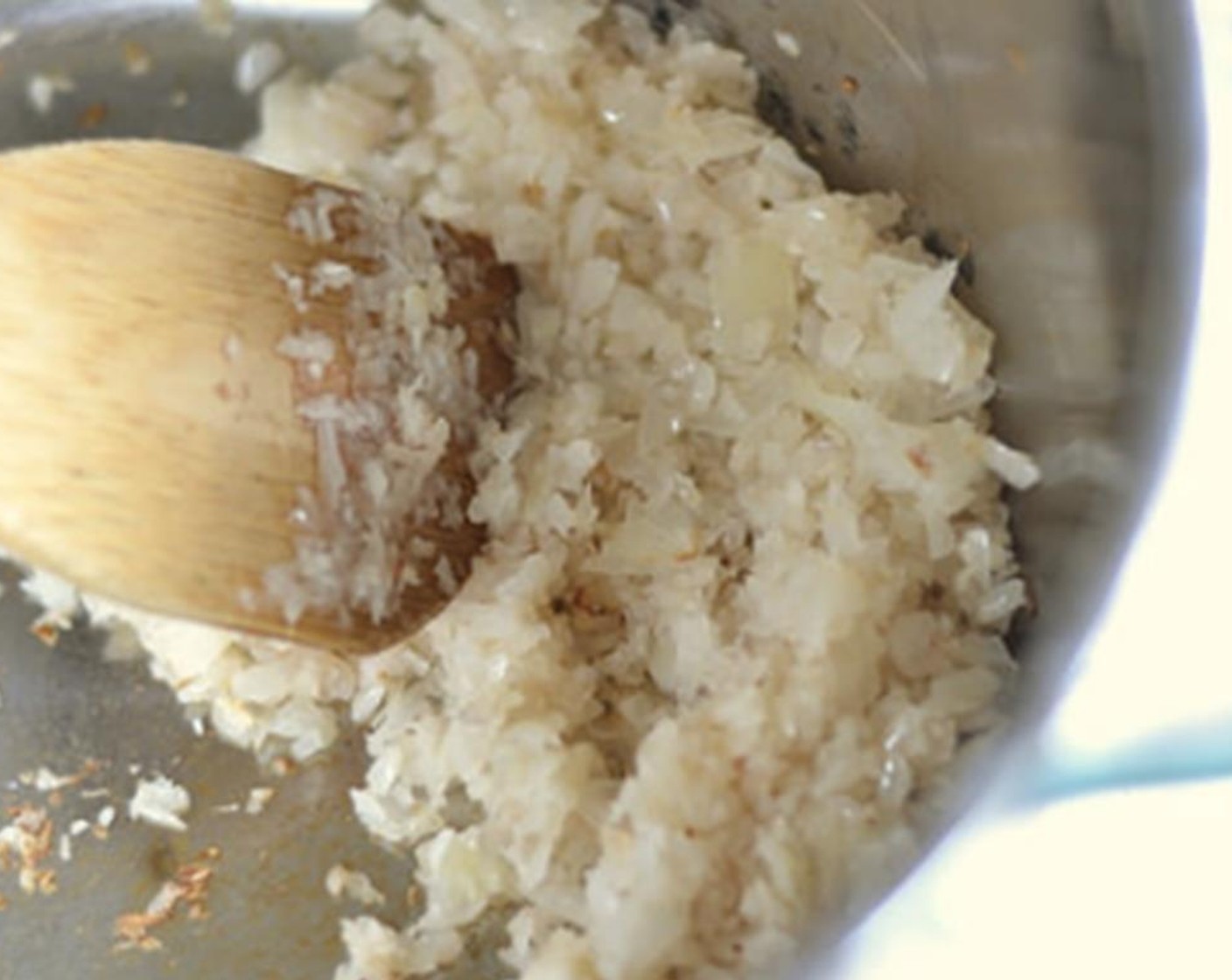 step 3 In another pot, sauté the Onion (1) until translucent. Then add the Garlic (2 cloves) and sauté another 30 seconds so it doesn't burn.