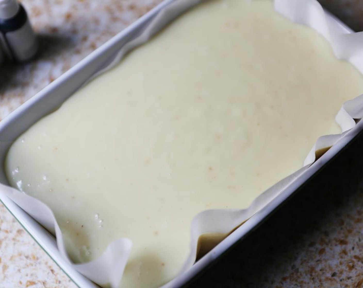 step 3 Pour into a ceramic or glass dish lined with baking paper.