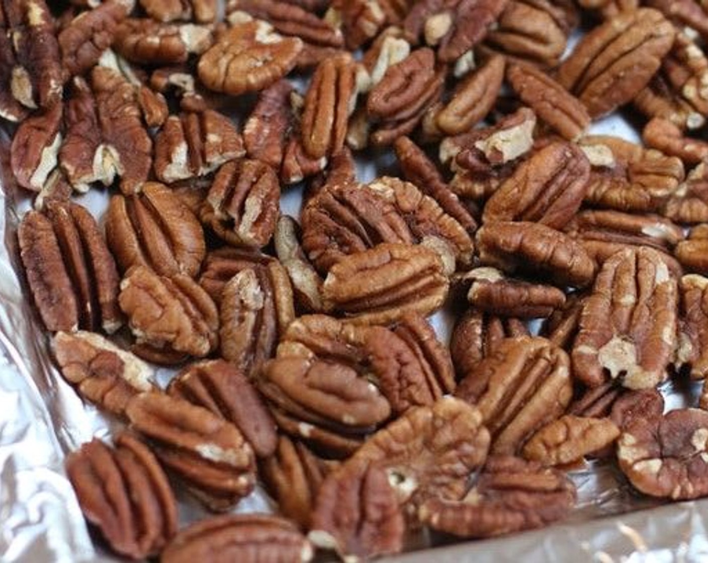 step 7 Toast the Pecans (2 cups) on a baking sheet for about 8 minutes, tossing them halfway through. After they have cooled, chop into desired pieces. I usually toast a few additional pecans to use as garnish for the top of my pie.