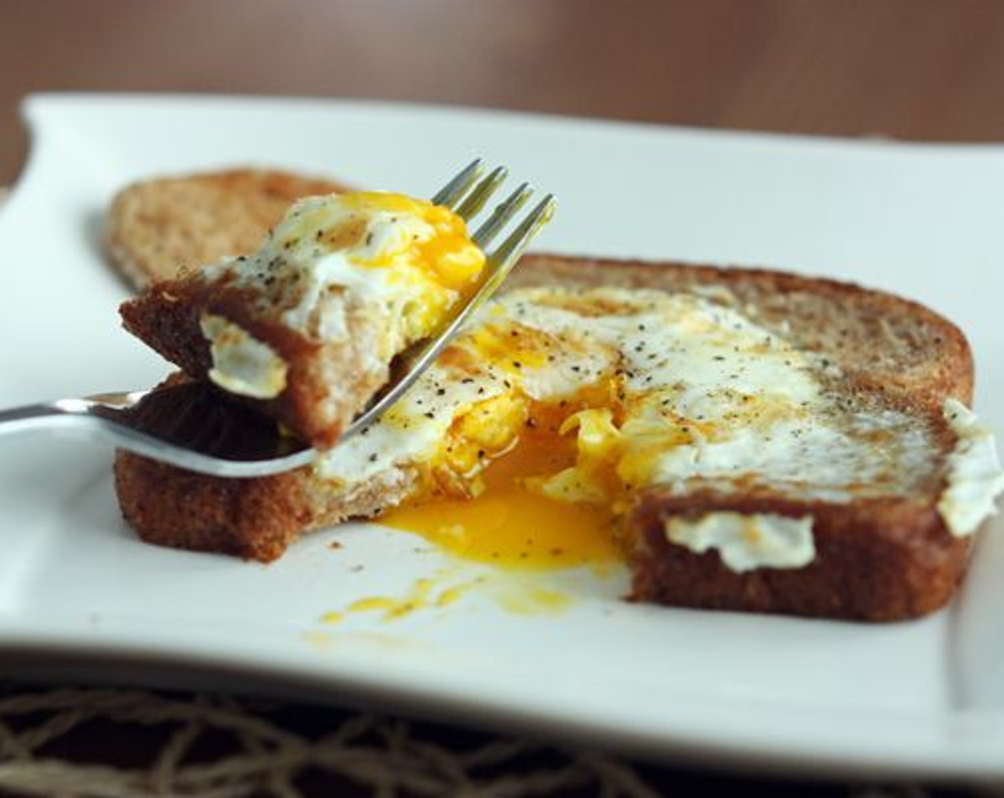 step 6 Lift the bread onto a plate and eat. Use your little center circle to soak up the warm, luscious yolk!