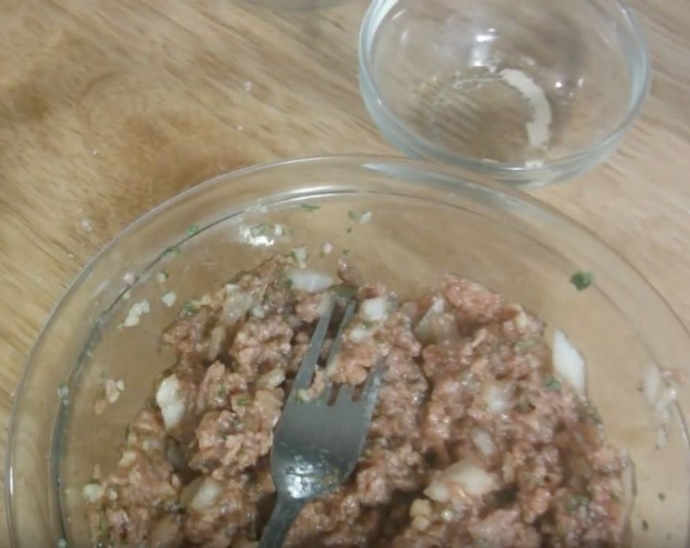 step 4 Add Soy Sauce (1 tsp), Onion (1), Dried Chives (1/2 Tbsp), Dried Parsley (1/2 tsp), Ground Black Pepper (1 tsp), Granulated Sugar (2 1/2 Tbsp), and Garlic (1 Tbsp). Mix well.