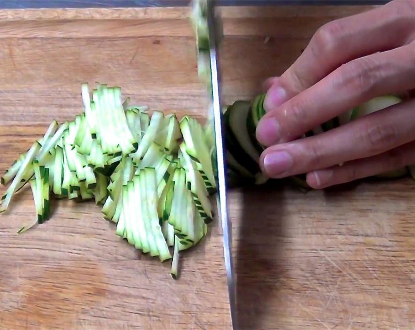step 1 Cut the Zucchini (1) into thin strips.