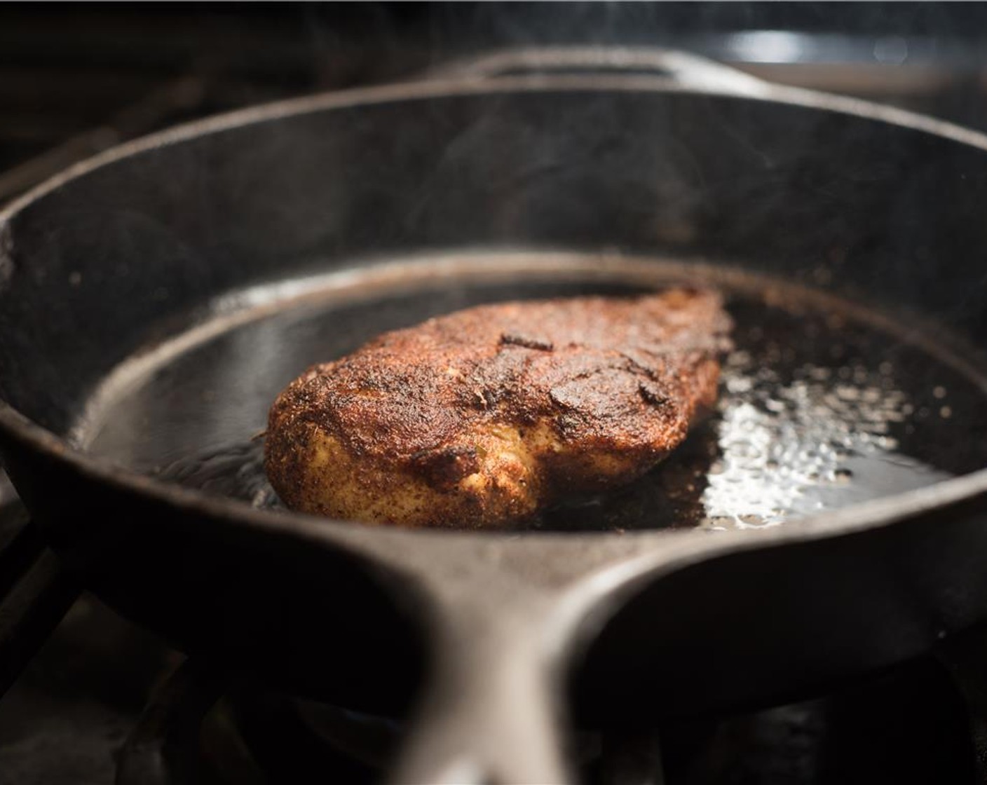 step 7 In a large sauté pan, warm Extra-Virgin Olive Oil (2 Tbsp) over medium-high heat. Cook the chicken 5 minutes on the first side and 4 minutes on the second. Remove from the pan, tent under foil, and allow to rest 5 minutes before slicing.