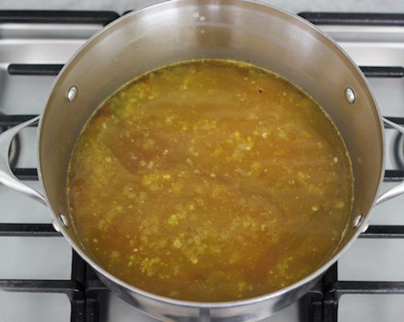 step 2 Pour in the Chicken Broth (8 cups).