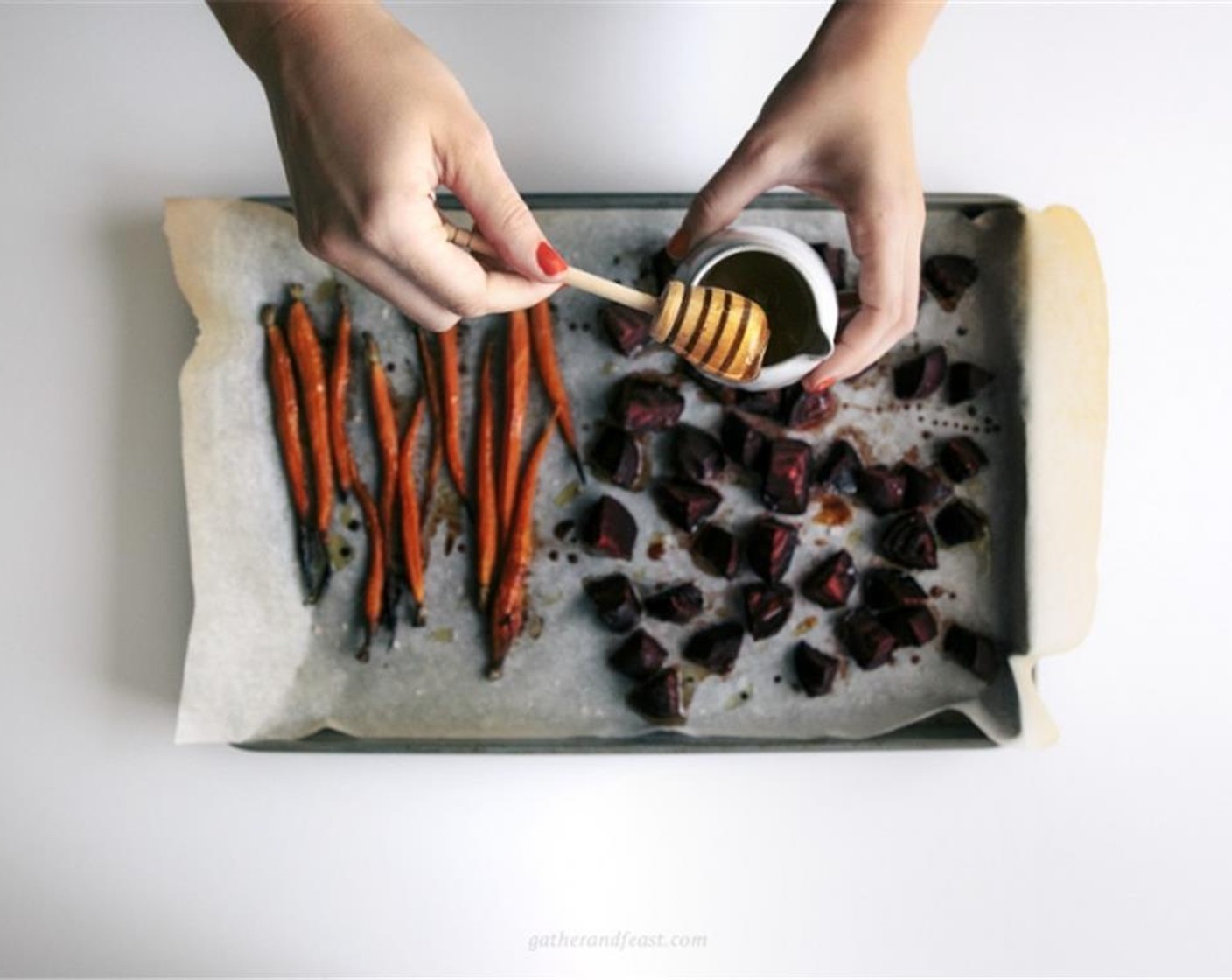 step 3 Once the beetroot and carrots are cooked, remove them from the oven, drizzle with more Honey (2 Tbsp) and set aside to cool.