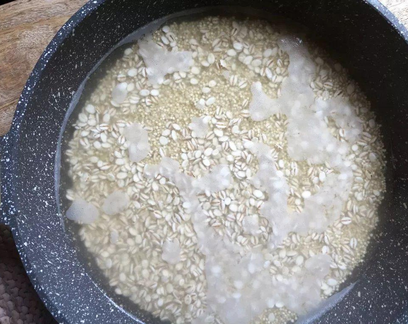 step 2 In a medium saucepan, bring Vegetable Broth (1 can) to boiling. Add Quick Cooking Barley (1/3 cup) and Quinoa (1/3 cup). Return to boiling; reduce heat to low.  Cook, covered, about 12 minutes or until tender.