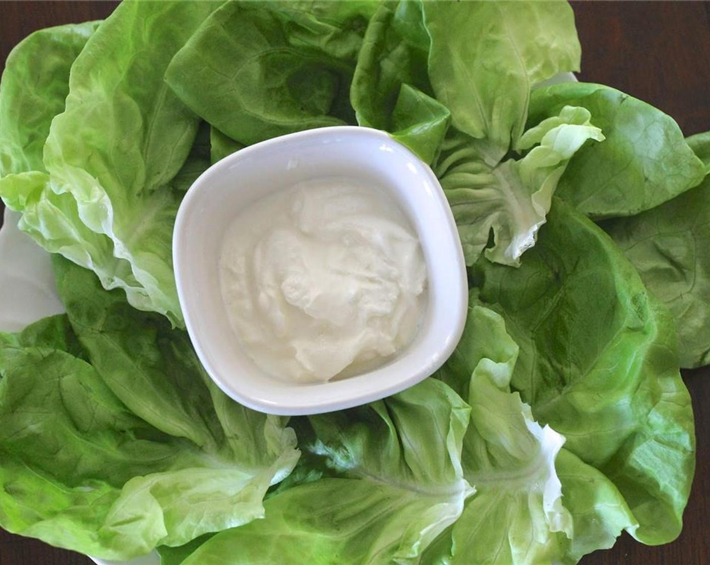 step 3 Wash and clean Lettuce (1 head), pat to dry and lay individual leaves onto a plate. Put some beef mince on each lettuce wrap and top with your choice of toppings.