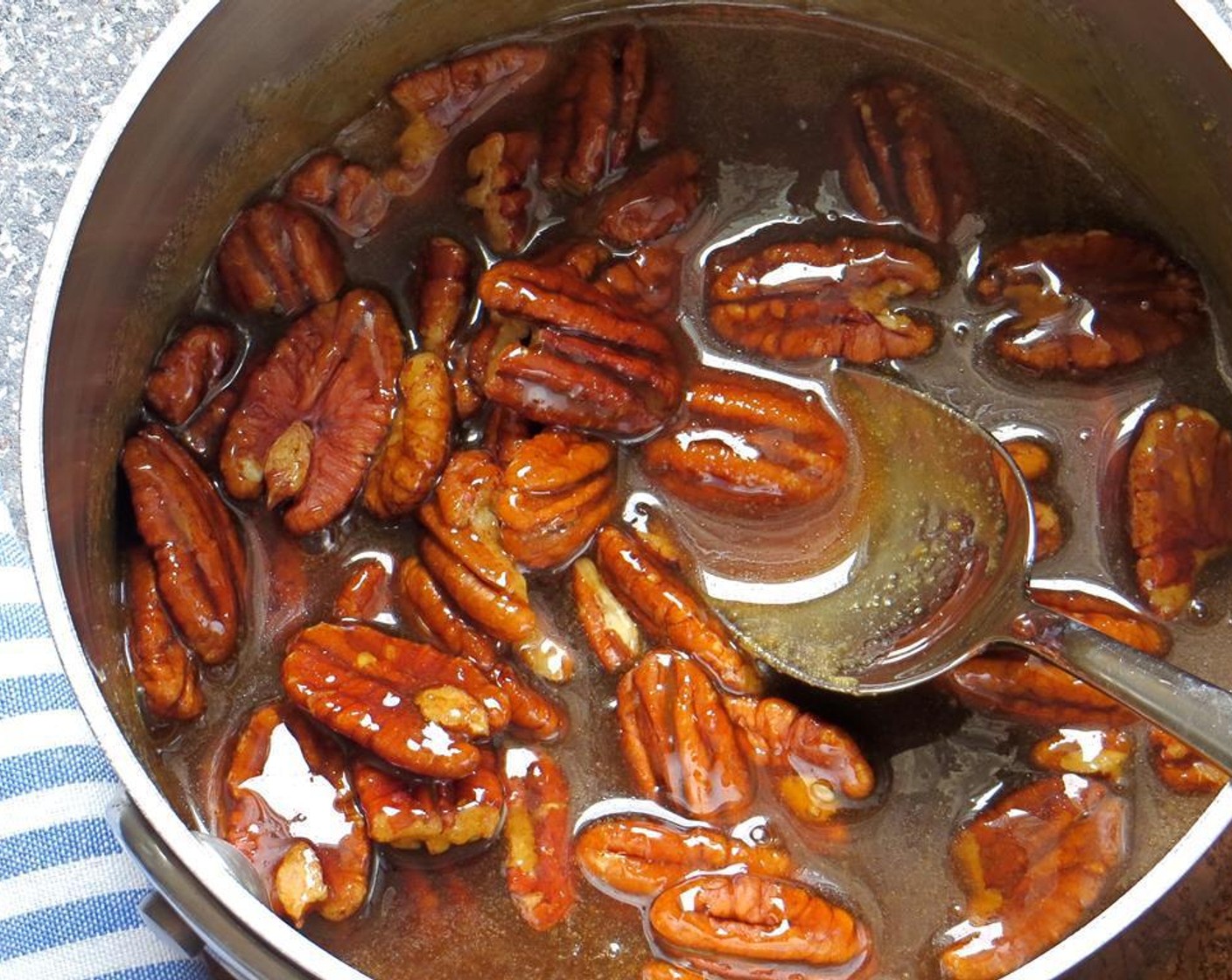 step 2 Add Pecans (3/4 cup) and continue to boil slowly for about 4 minutes. Remove from heat.