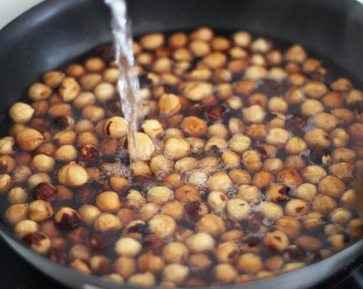 step 6 Add Water (2 cups) and cook for 10-15 minutes just till the nuts get soften. Then add Salt (1 pinch).